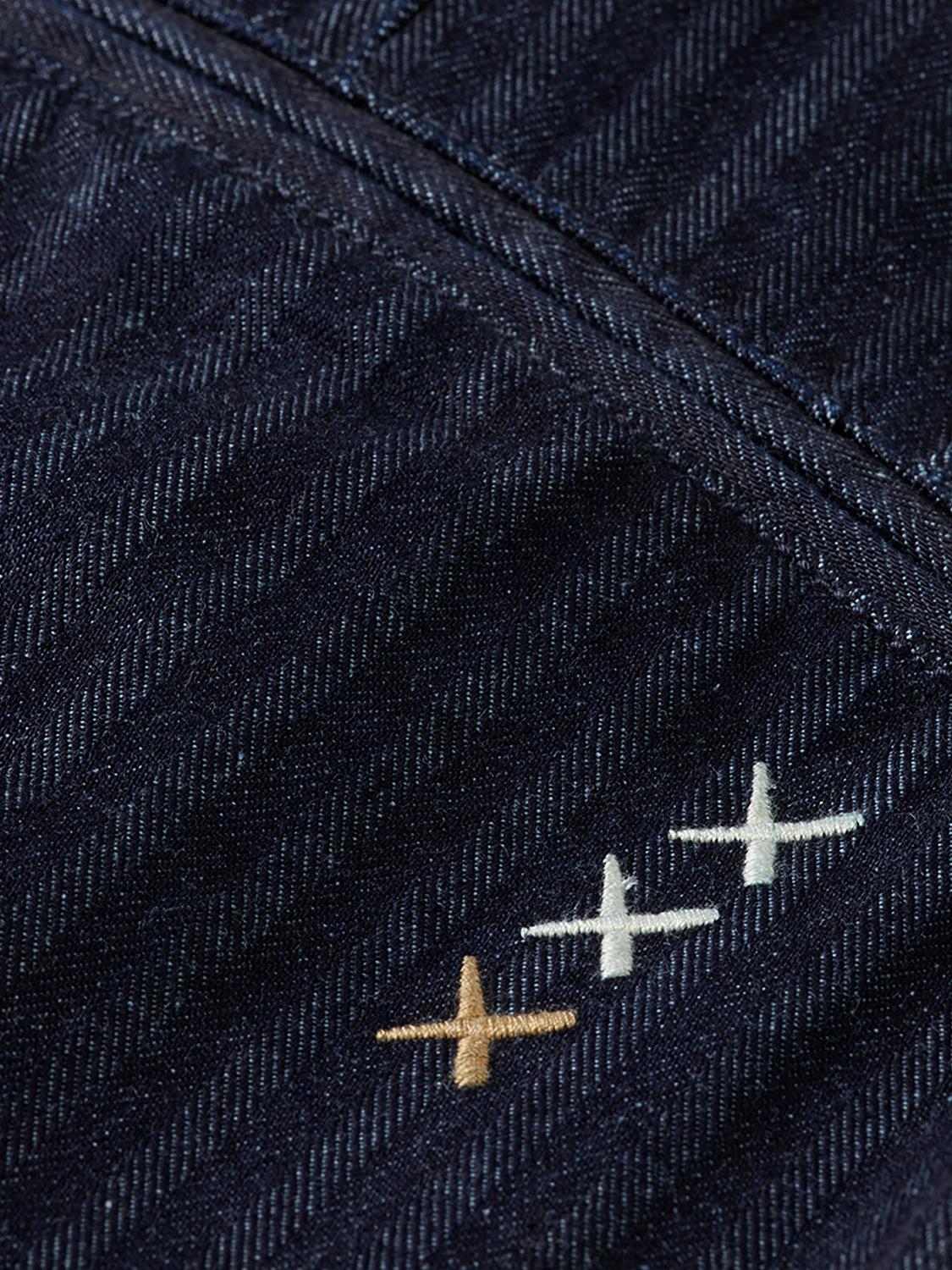 Loose-fit denim jeans by Scotch & Soda, showing classic five-pocket design and casual fit in lightweight blue denim fabric.