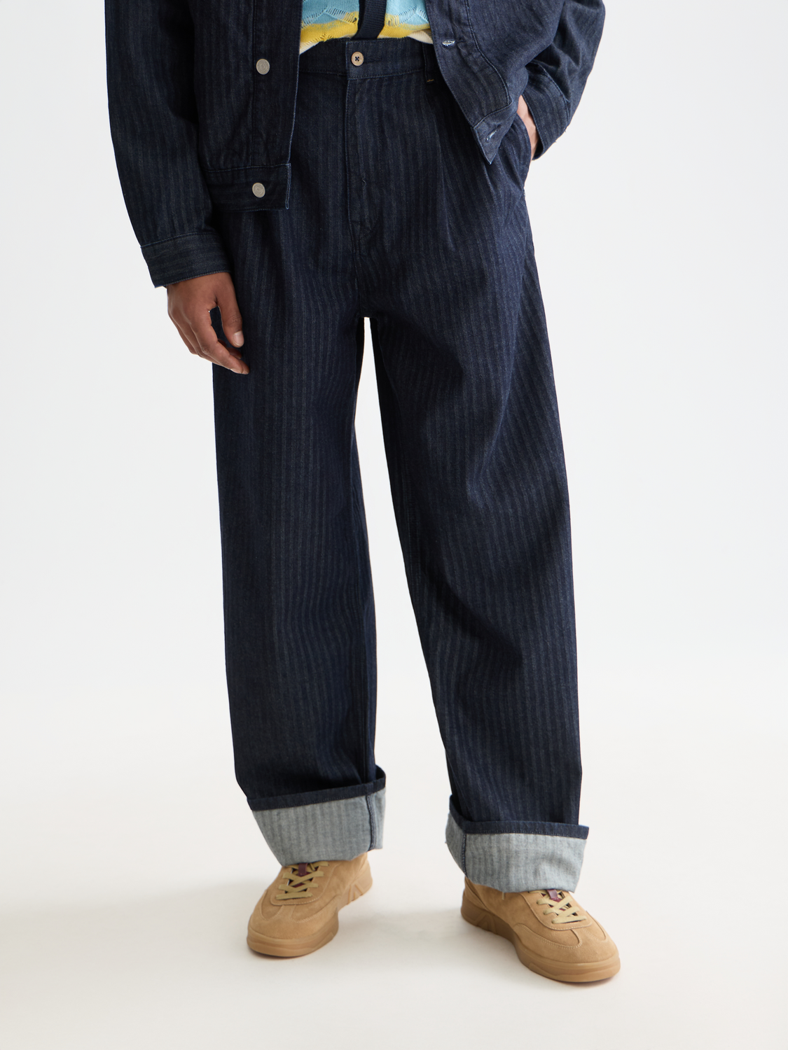 Loose-fit denim jeans by Scotch & Soda, featuring a casual style and classic blue wash, displayed on a model.
