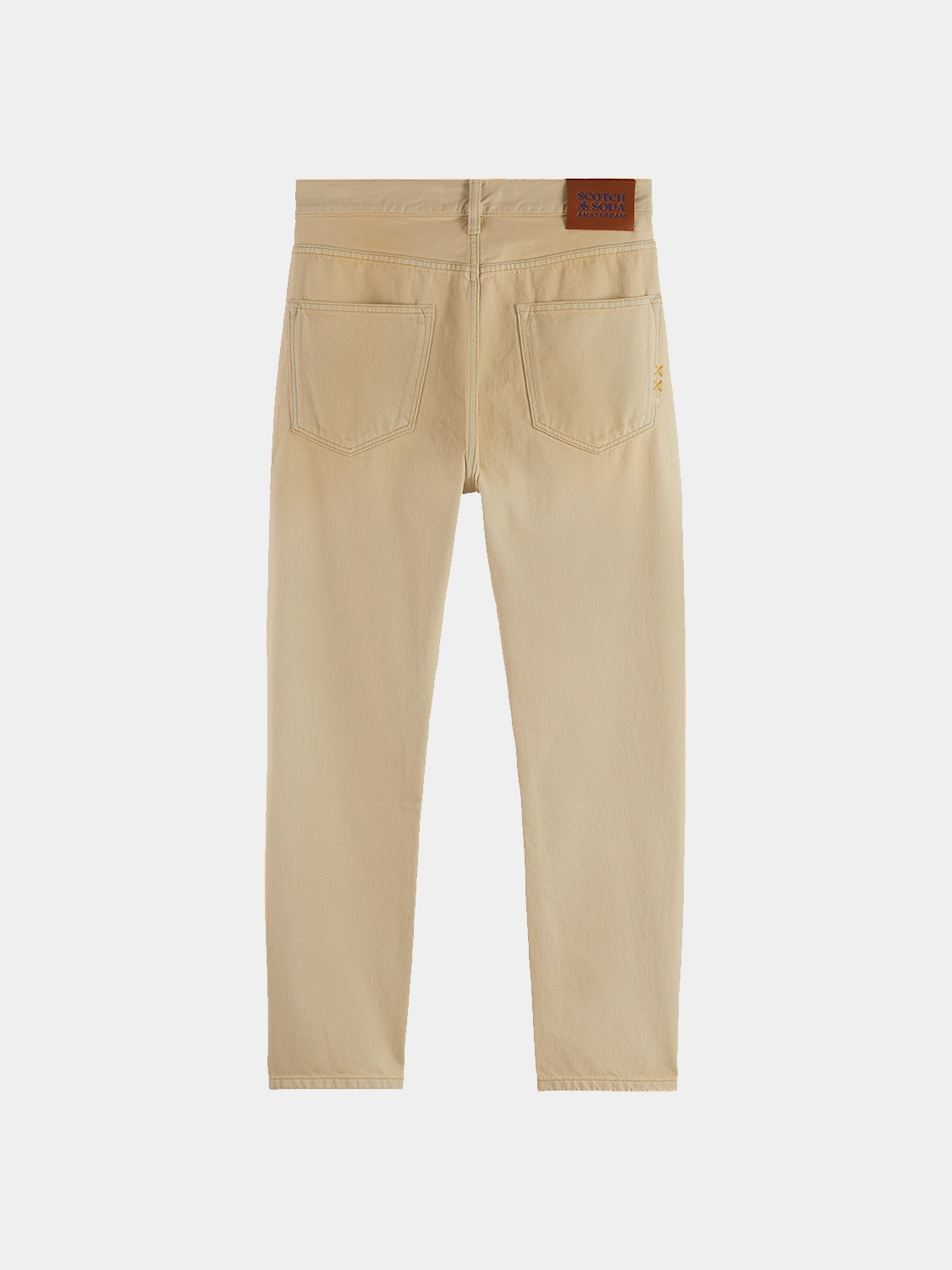Dark blue Scotch & Soda Dean tapered denim jeans with classic five-pocket design and modern fit, displayed on a plain background.