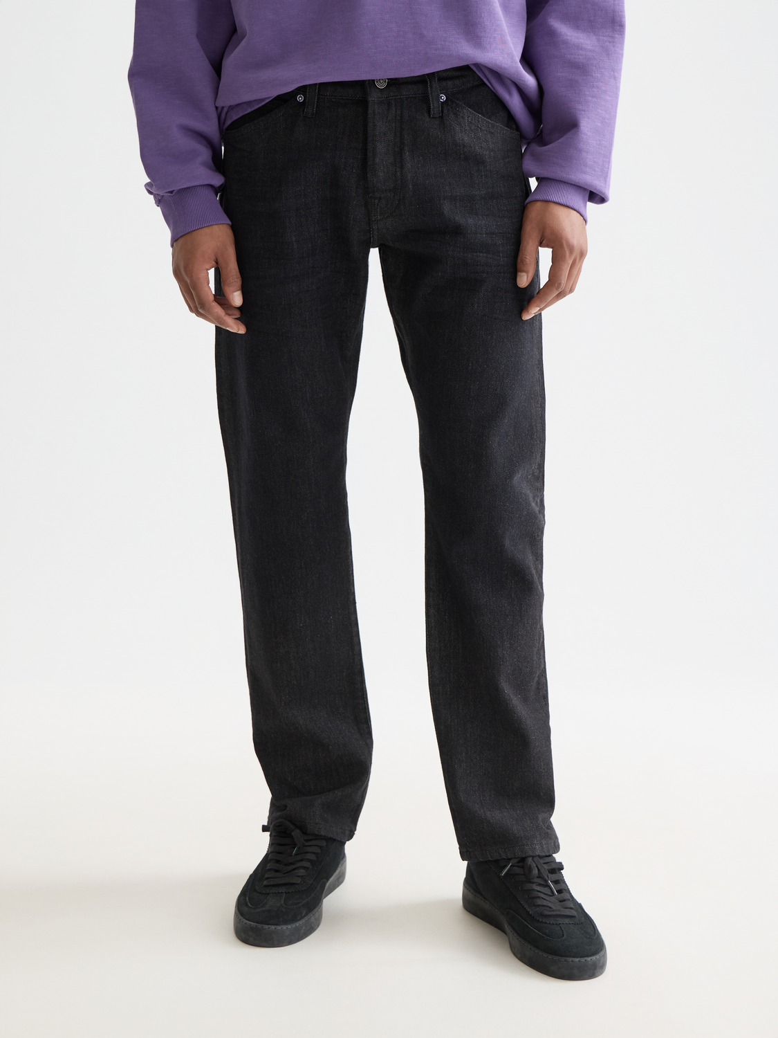 Scotch & Soda Zee straight-fit denim jeans displayed on a hanger, showing classic blue denim fabric and simple design.