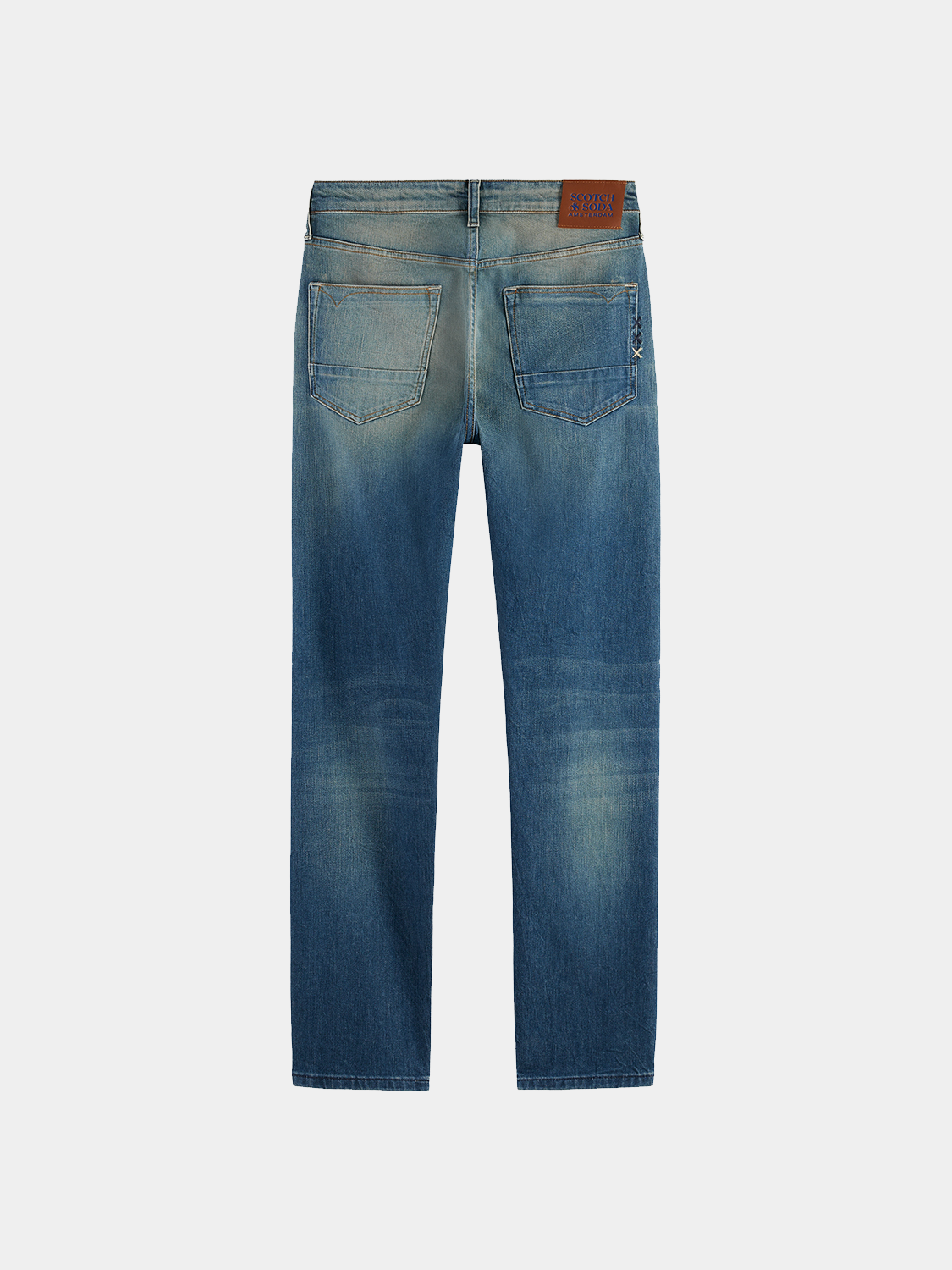 Pair of black Ralston slim-fit Scotch & Soda denim jeans displayed on a white background.