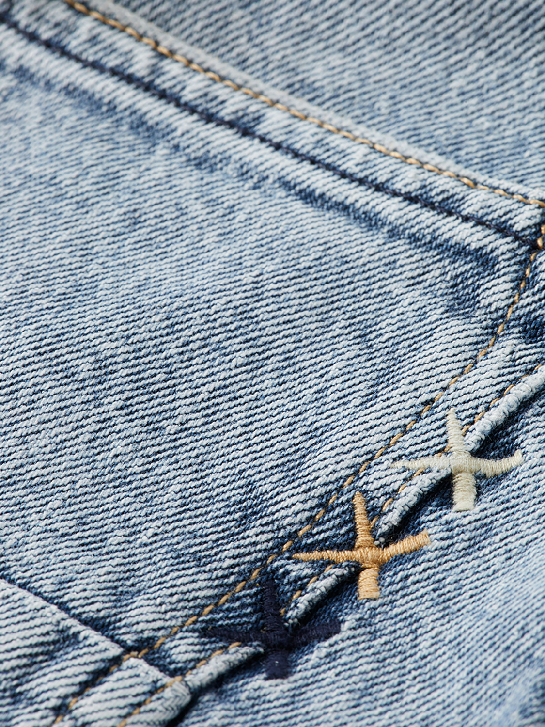 Slim-fit Ralston denim jeans by Scotch & Soda, showcasing classic blue color and detailed stitching on a clean background.