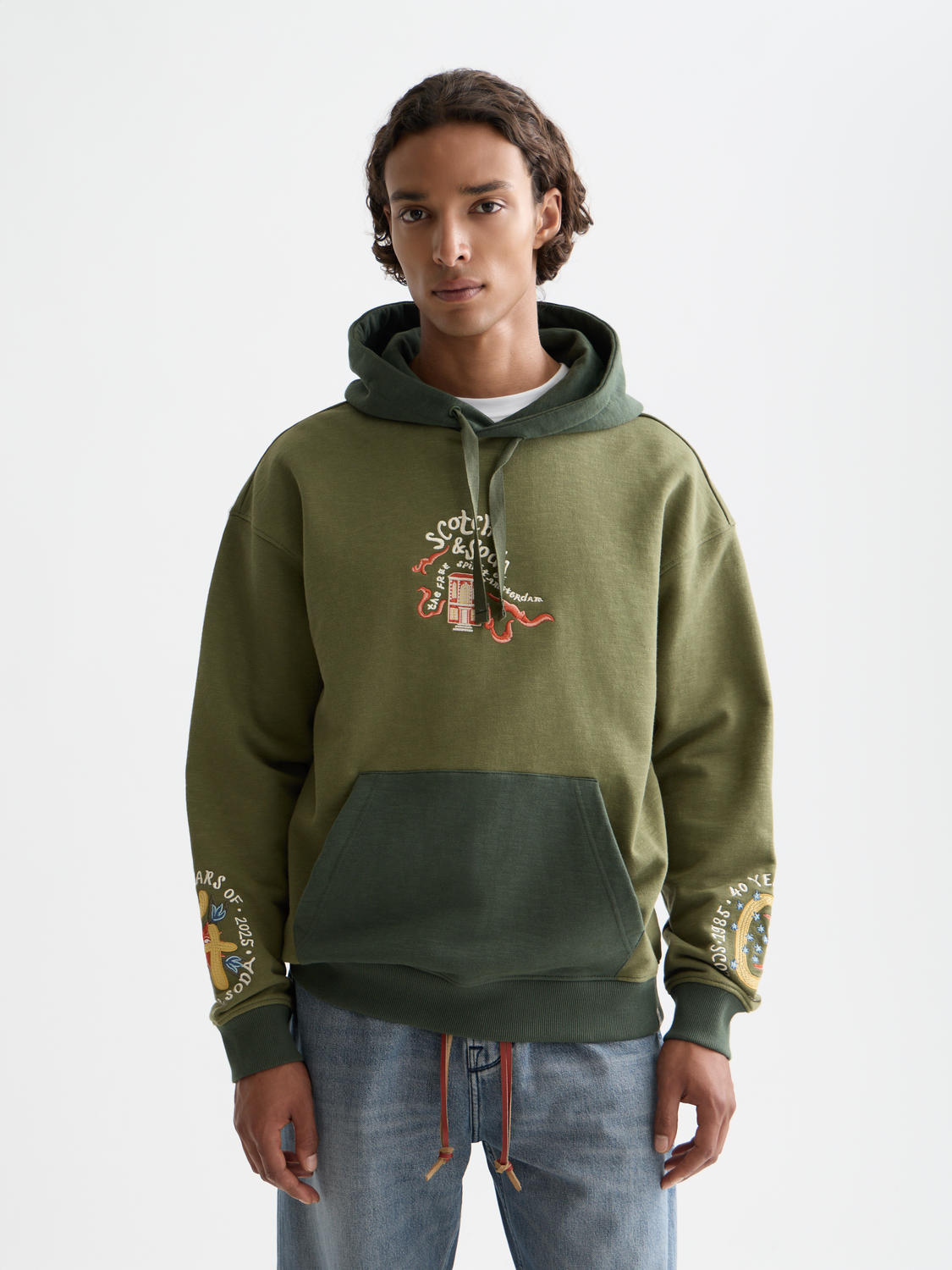Embroidered hoodie from Scotch & Soda, featuring detailed embroidery on soft sweats fabric, front view.