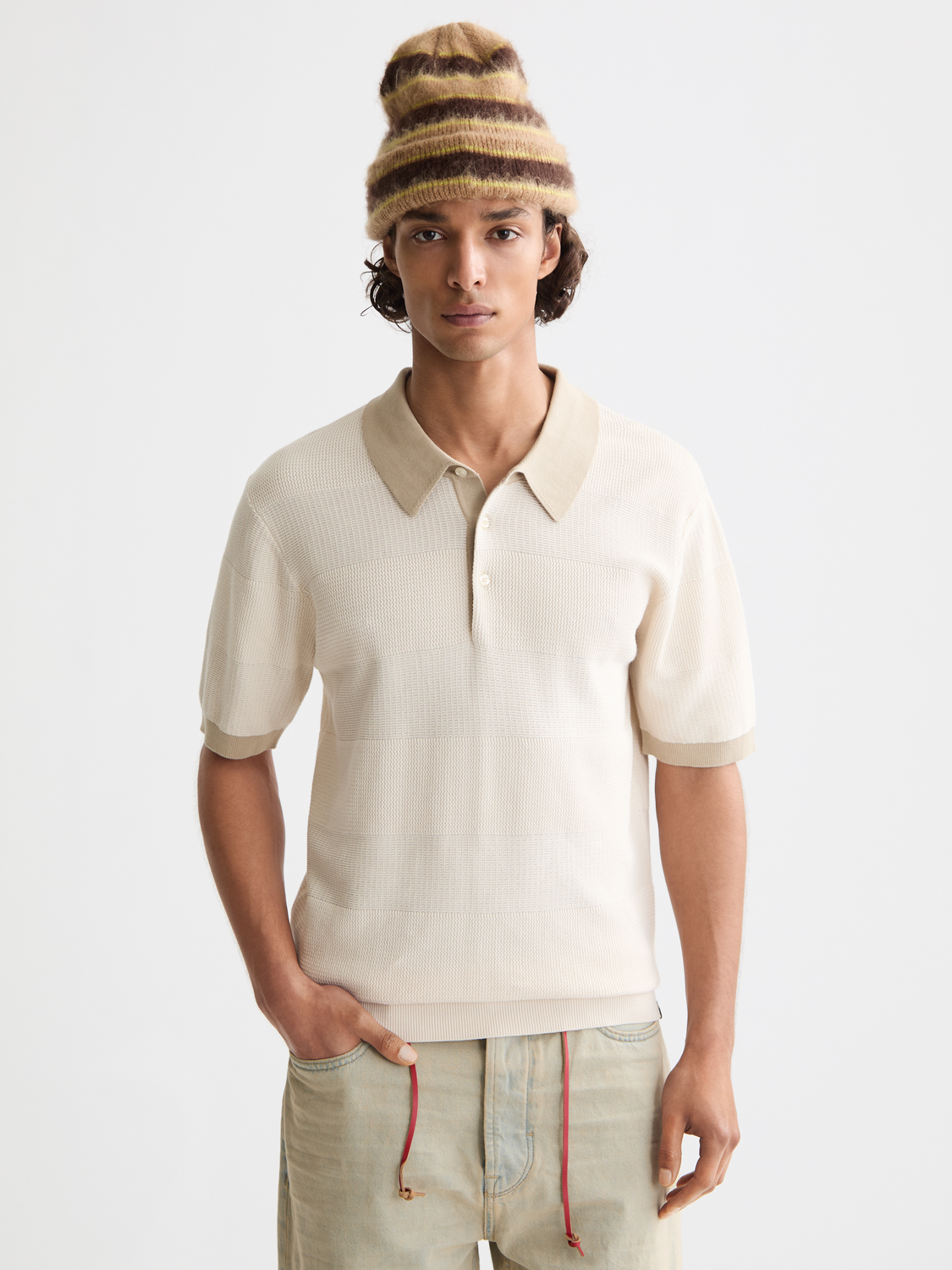Knitted tonal polo shirt by Scotch & Soda, featuring a classic collar and short sleeves in a textured knit fabric.