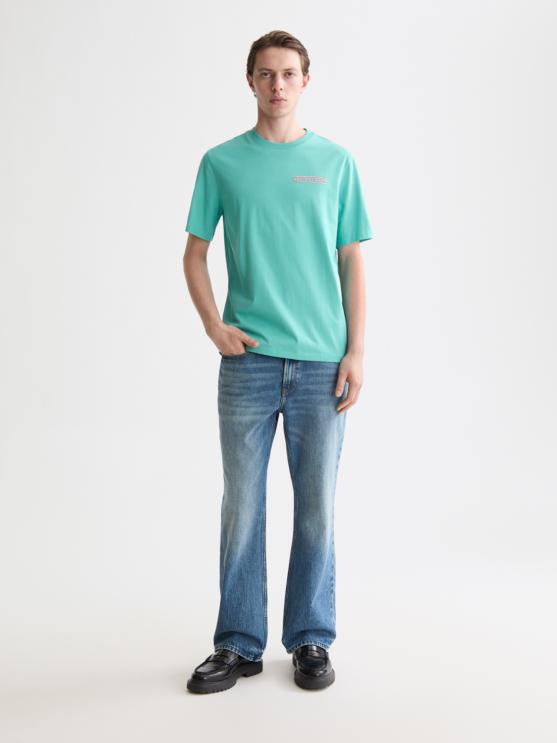 Short sleeve Scotch & Soda artwork T-shirt featuring colorful graphic print on front, casual style for everyday wear.
