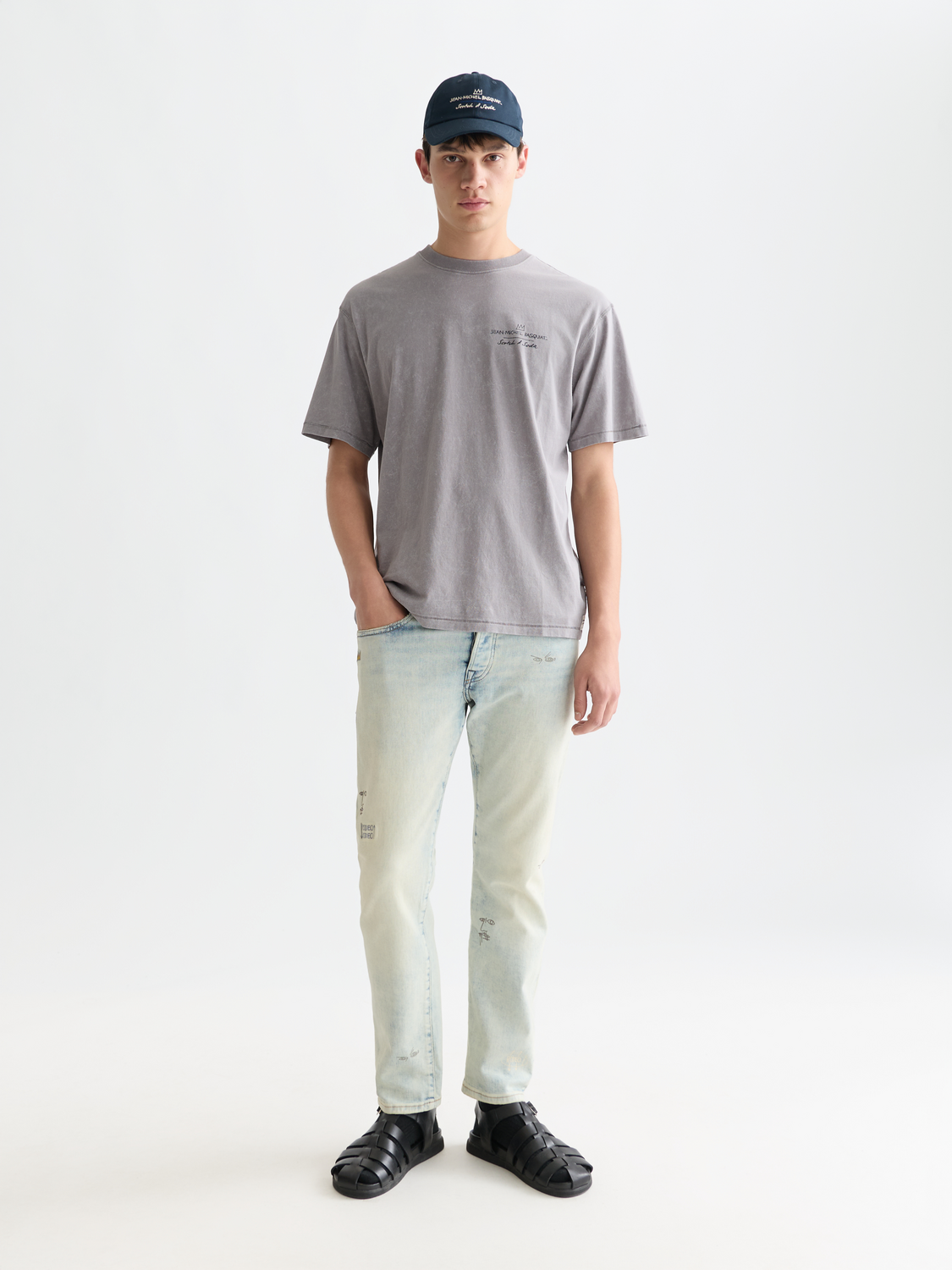 Short sleeve Scotch & SODA t-shirt featuring a S&S x Basquiat artwork graphic on the front.