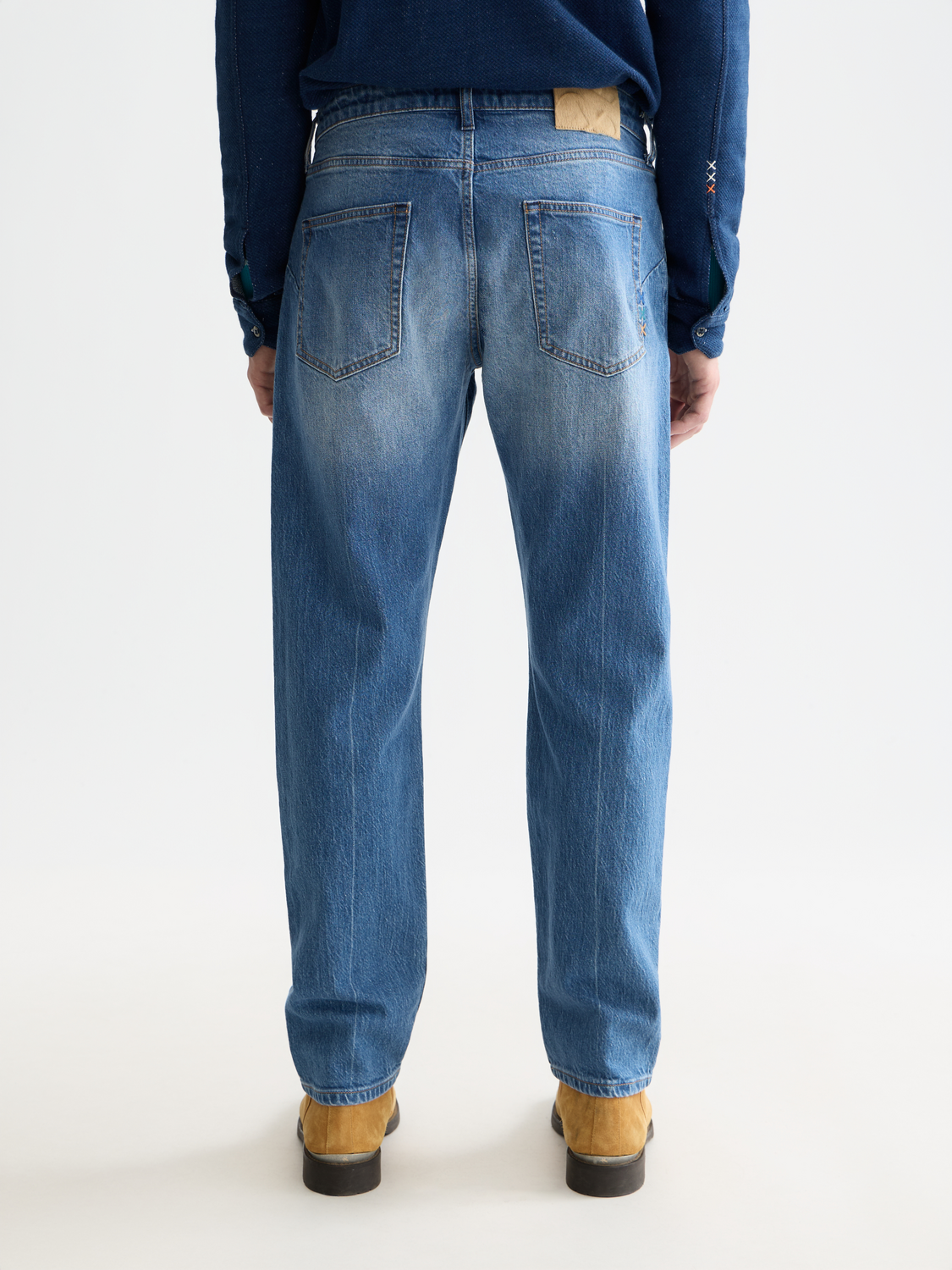 SCOTCH & SODA Zee straight-fit denim jeans shown from the back, featuring classic five-pocket design and dark wash finish.