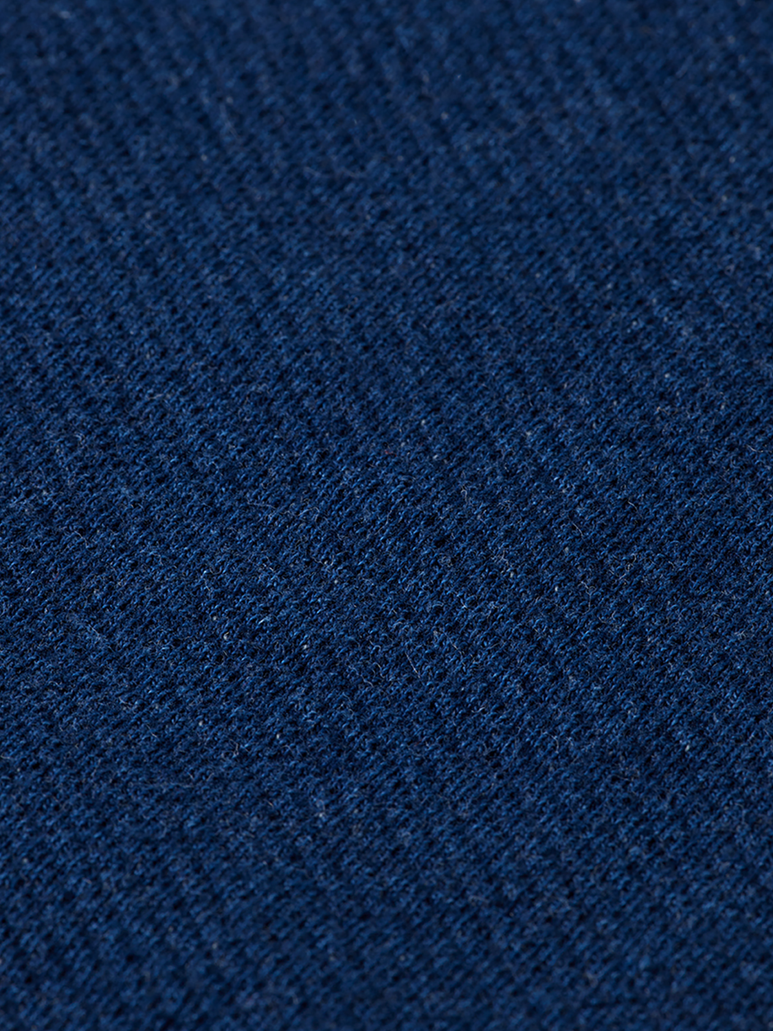 Washed indigo Scotch & Soda long-sleeve shirt with a classic collar and button front, displayed on a hanger.