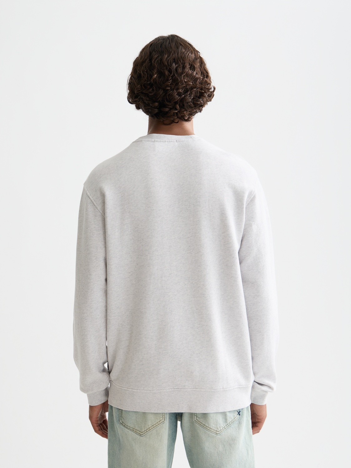 Dark gray Scotch & Soda artwork sweatshirt with a relaxed fit and graphic design on the back, casual streetwear style.