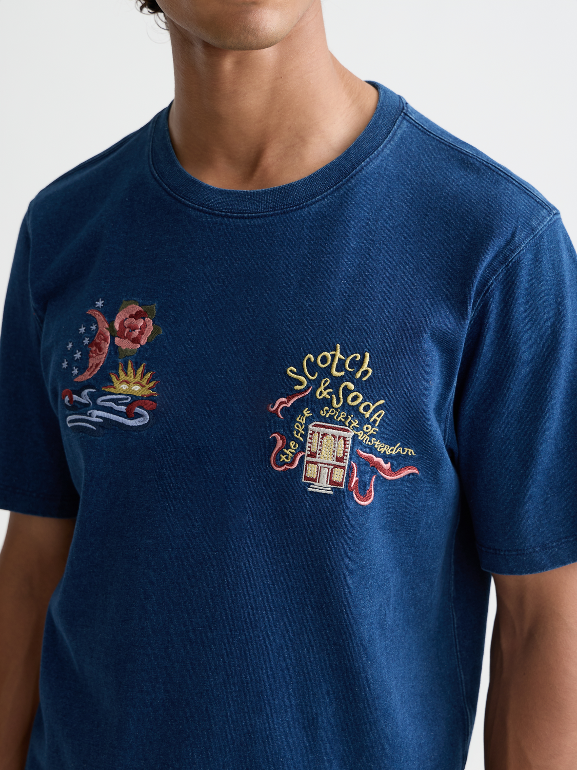 Embroidered indigo short-sleeve T-shirt by Scotch & Soda with detailed floral embroidery on front.