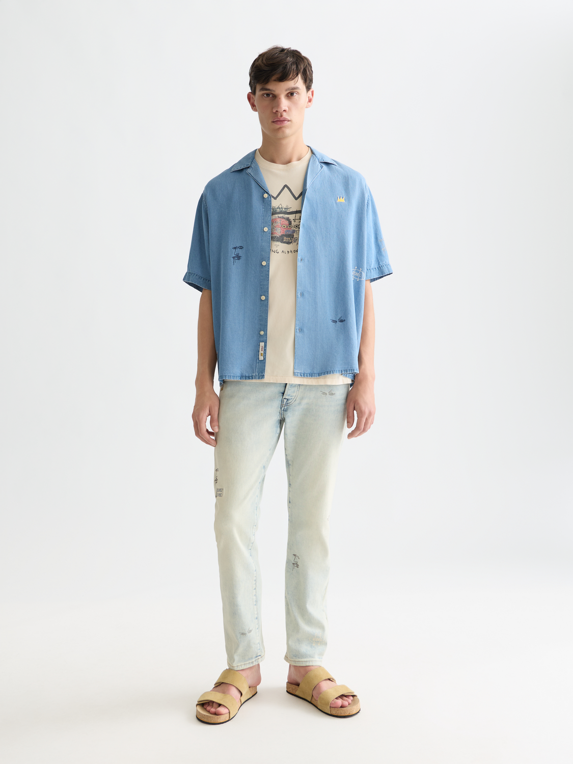 Indigo short-sleeved shirt by Scotch & Soda featuring Basquiat artwork, casual style, and classic fit.
