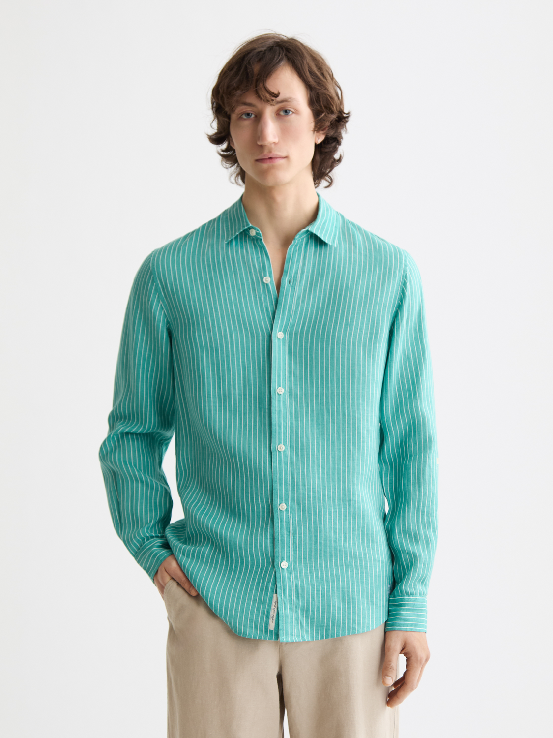 Striped linen long-sleeve shirt by Scotch & Soda showing front view with classic collar and button-down design.