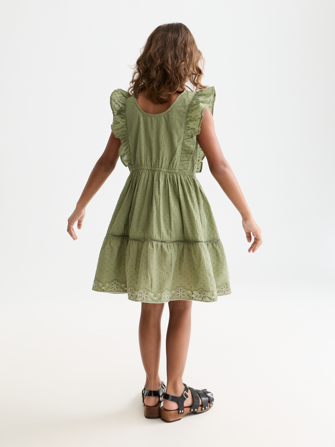 Kids embroidered jacquard dress by Scotch & Soda, showing a back view with intricate embroidery and textured fabric.