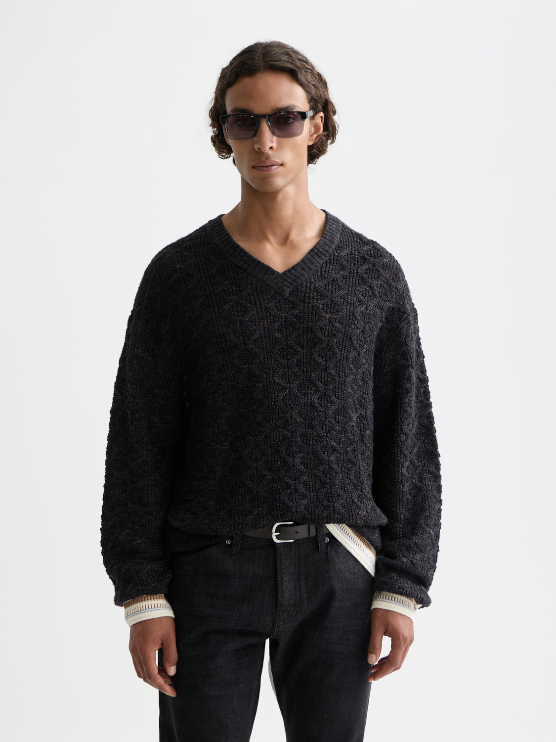 SCOTCH & SODA V-neck cable knit pullover in navy, featuring textured cable patterns and a classic fit.
