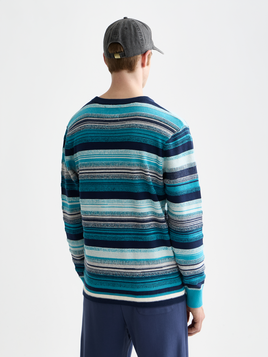 Striped knitwear pullover by Scotch & Soda featuring colorful horizontal stripes and a relaxed fit.