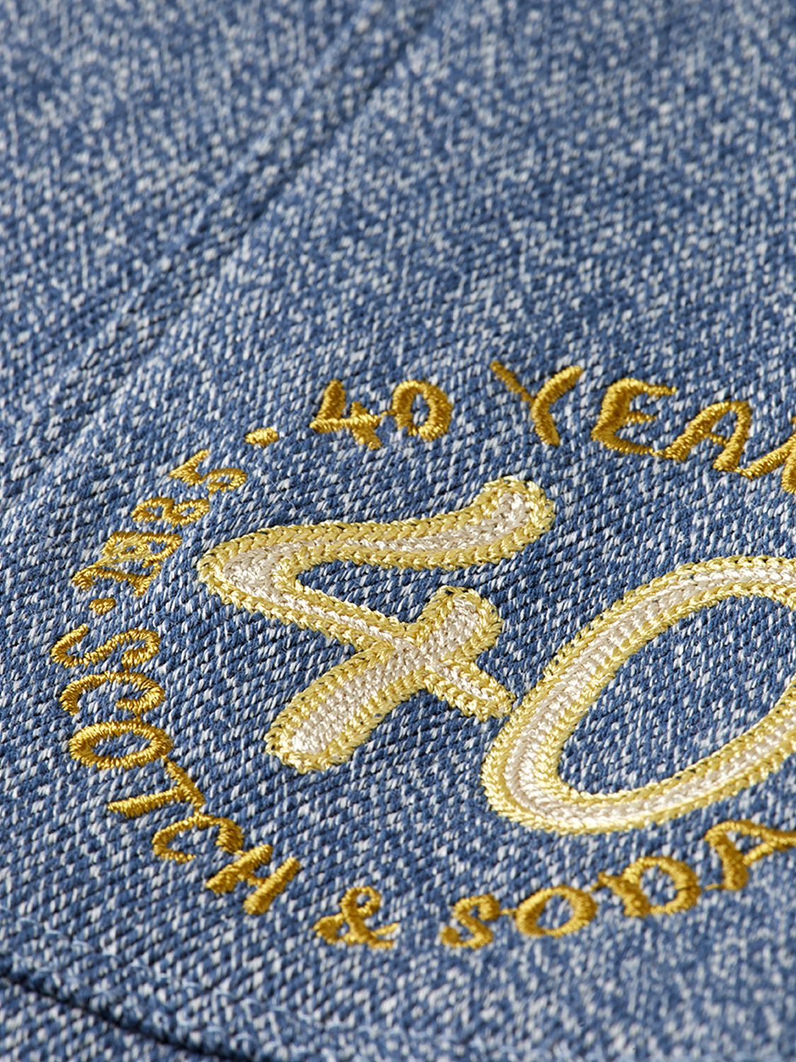 Loose straight-fit cargo pants by SCOTCH & SODA, shown in a neutral color with multiple pockets and relaxed fit.