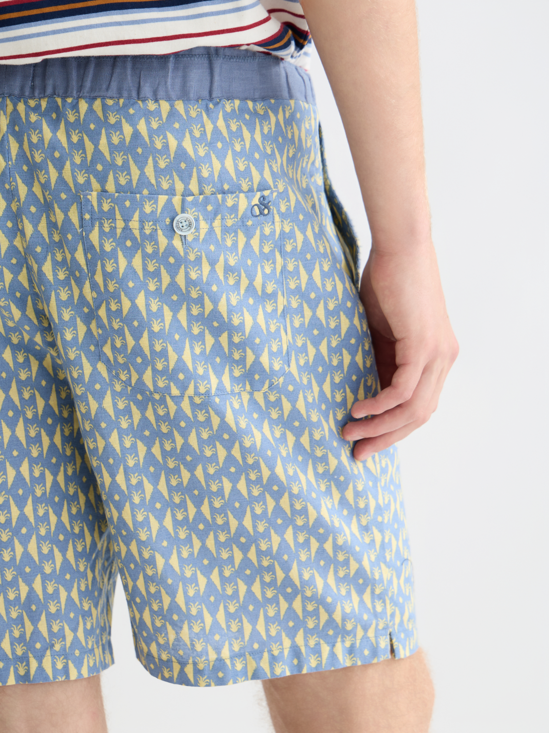 Printed shorts by Scotch & Soda featuring a vibrant floral pattern, casual fit, and lightweight fabric suitable for warm weather.