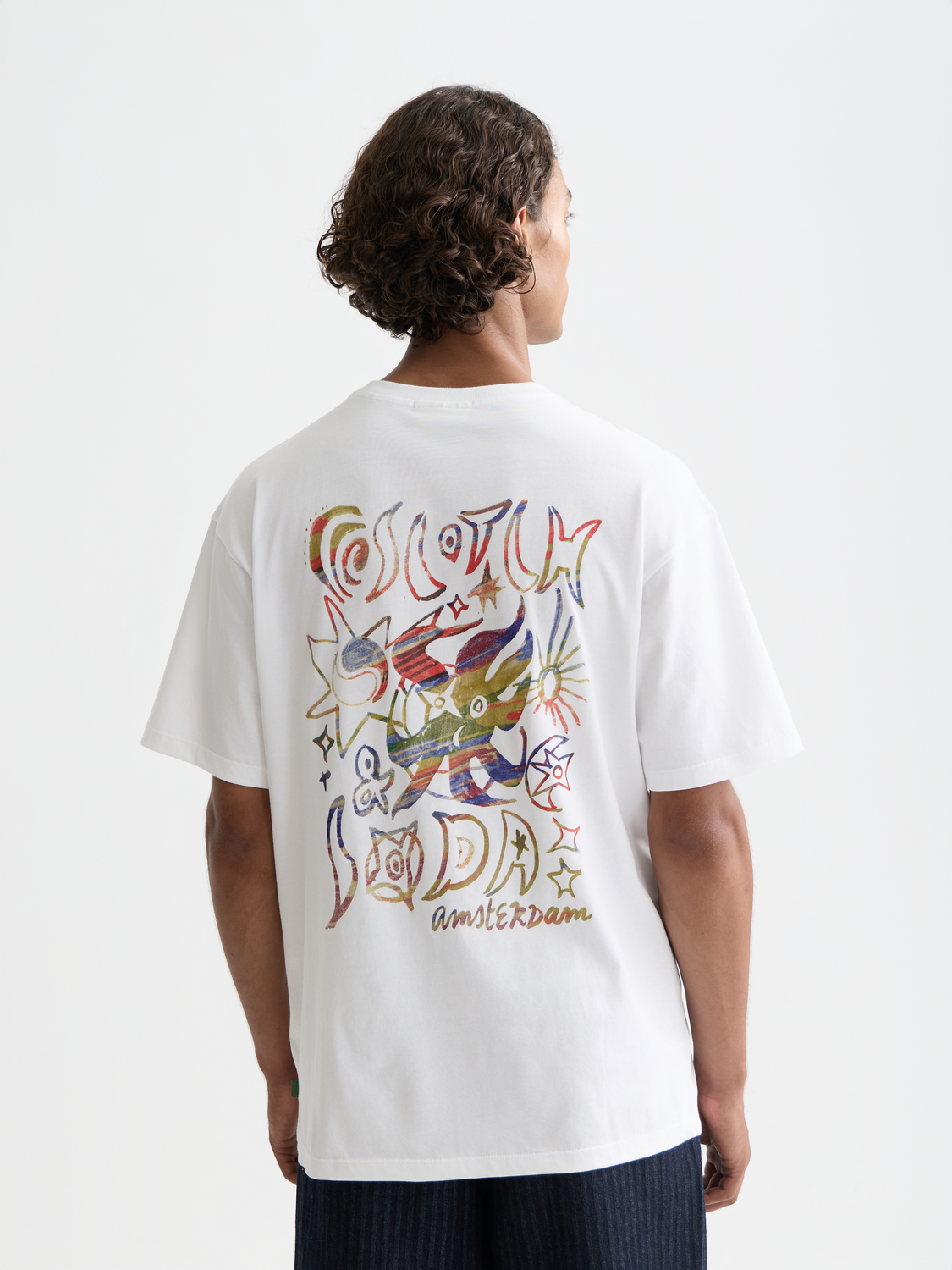 Black artwork t-shirt from SCOTCH & SODA with short sleeves and graphic design on the front.