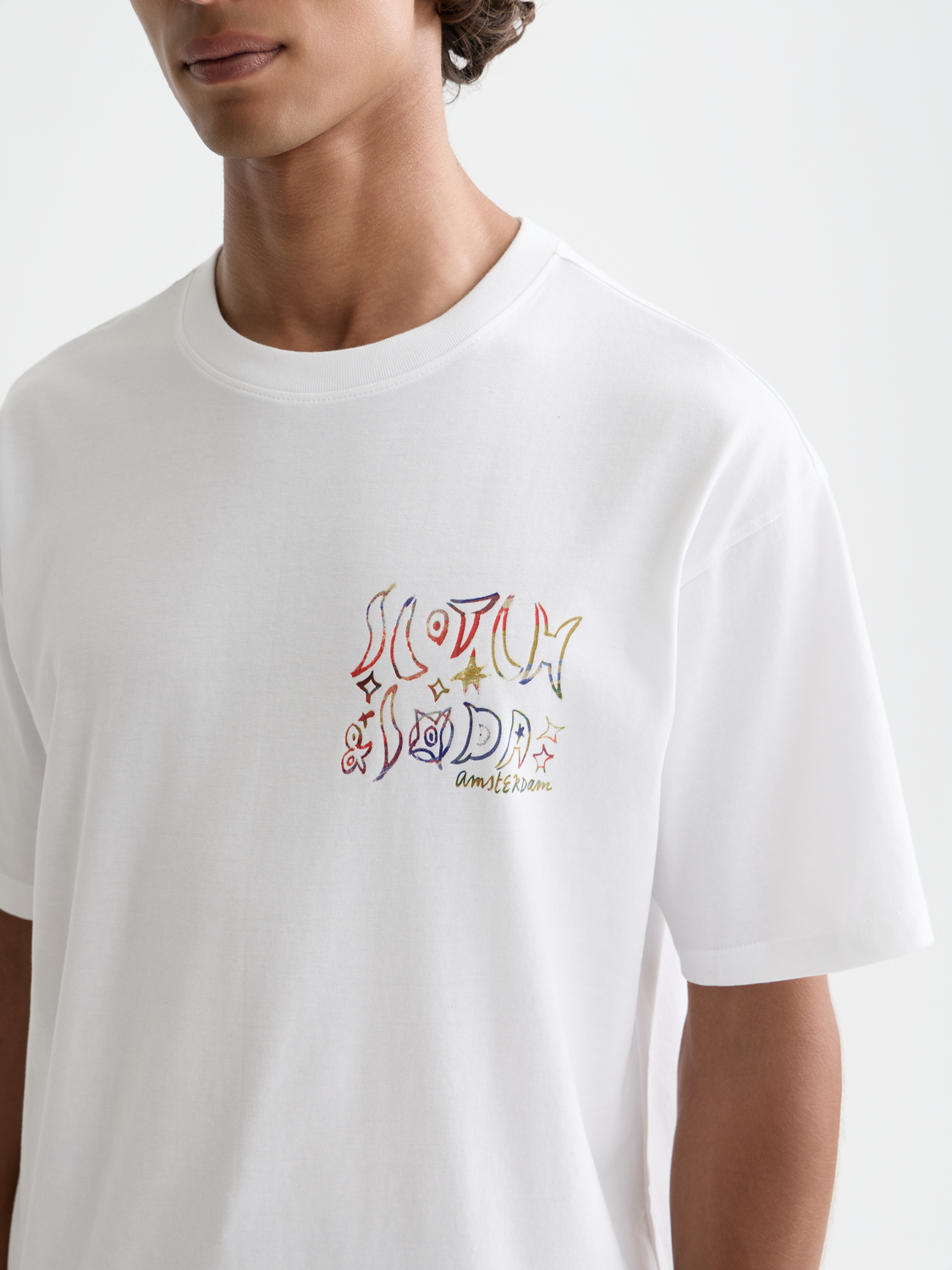 Scotch & Soda short sleeve artwork t-shirt with colorful graphic print on soft cotton fabric.