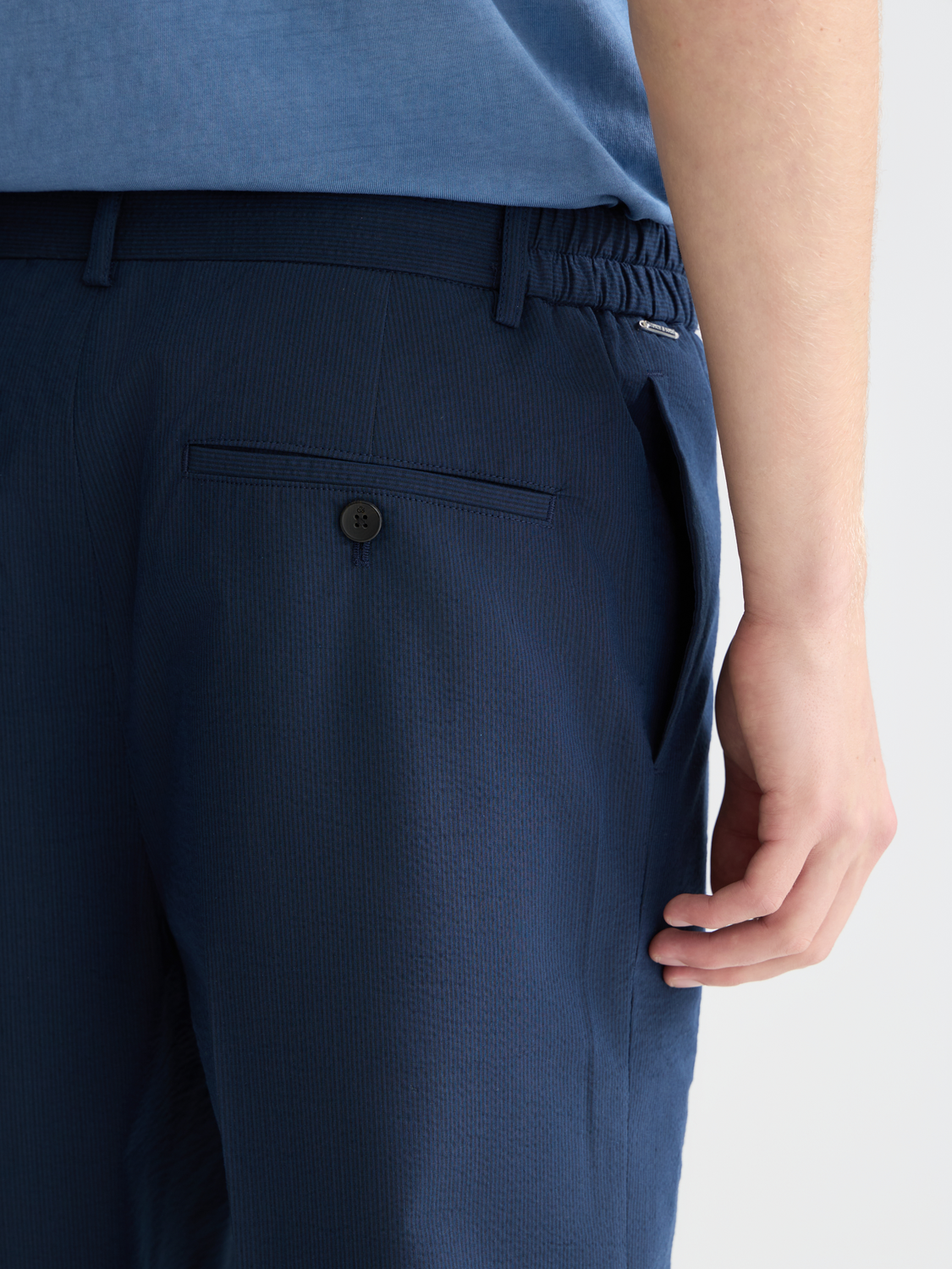 Light blue Scotch & Soda seersucker shorts with a relaxed fit, featuring a textured fabric and casual style.
