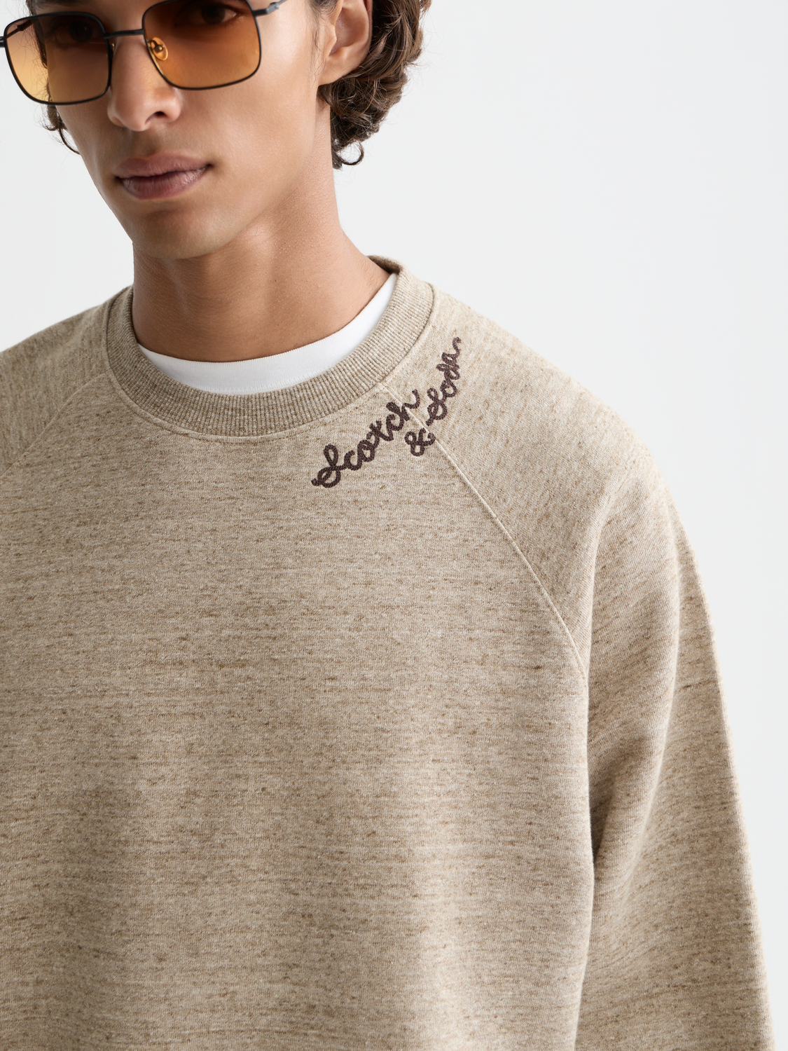 Space yarn sweatshirt by Scotch & Soda, showing a cozy, stylish sweater with space-themed knit design and ribbed cuffs.