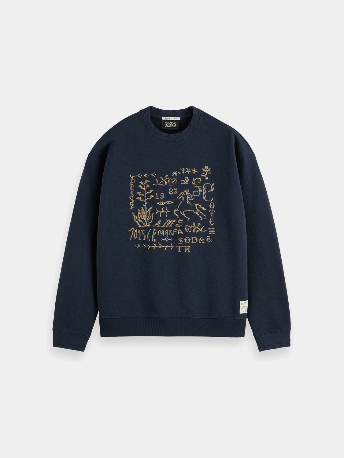 Embroidered artwork sweatshirt by Scotch & Soda featuring colorful stitched designs on a casual sweats top.