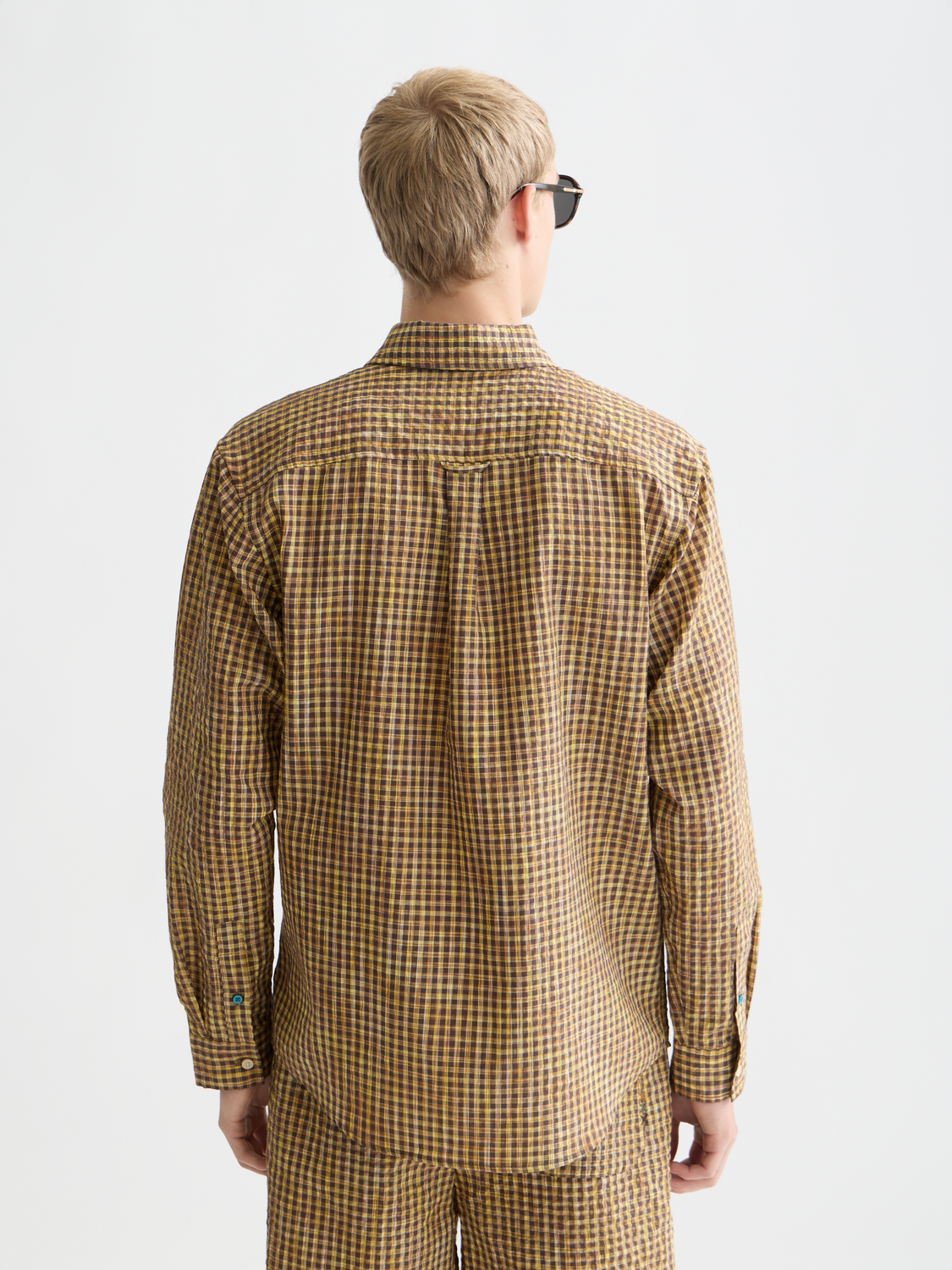 Long sleeve Scotch & Soda seersucker micro-check shirt with a collar, shown from the back in a detailed product image.