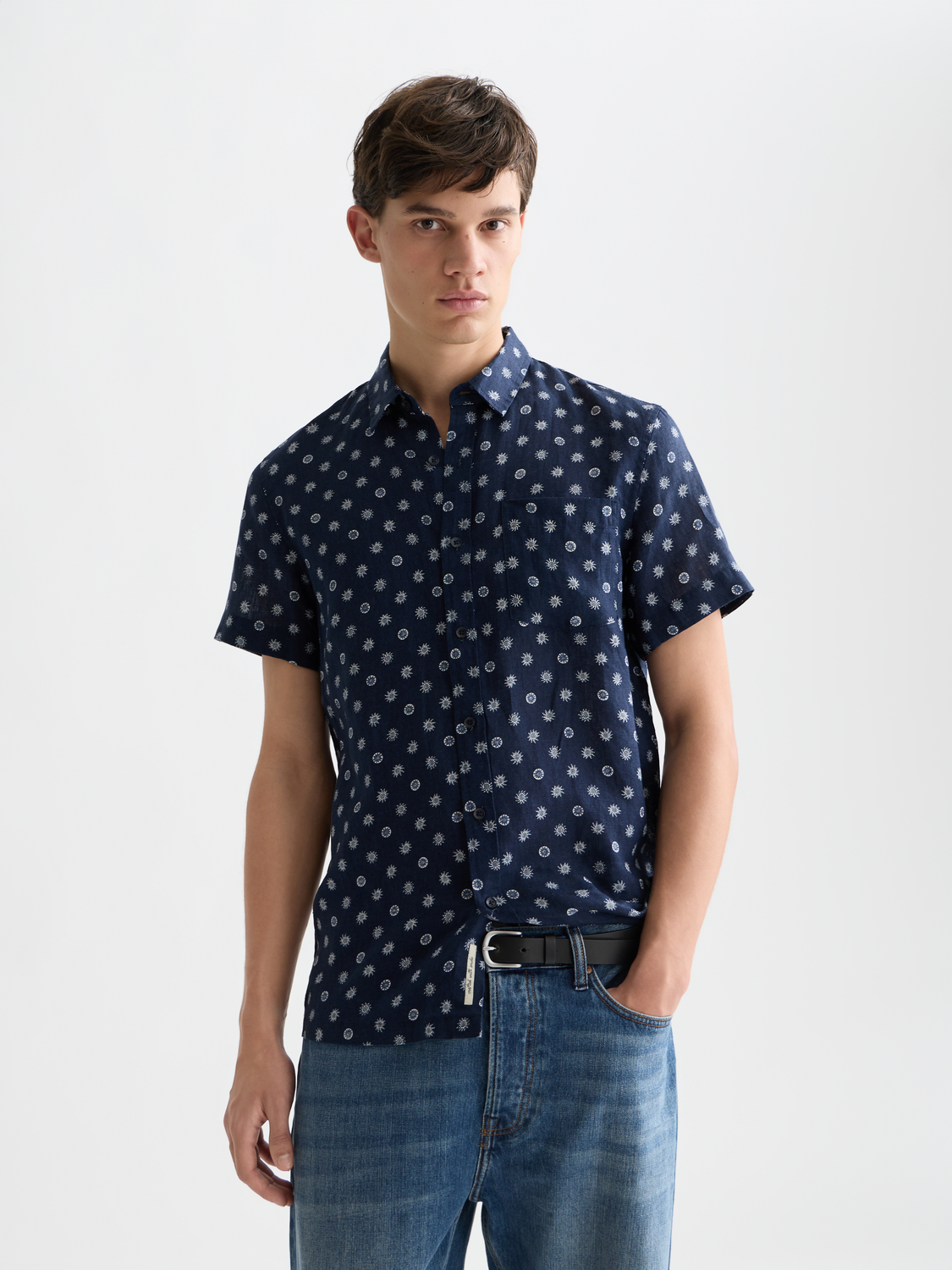 Printed short-sleeved linen shirt by Scotch & Soda, featuring a stylish design and lightweight fabric, front view.