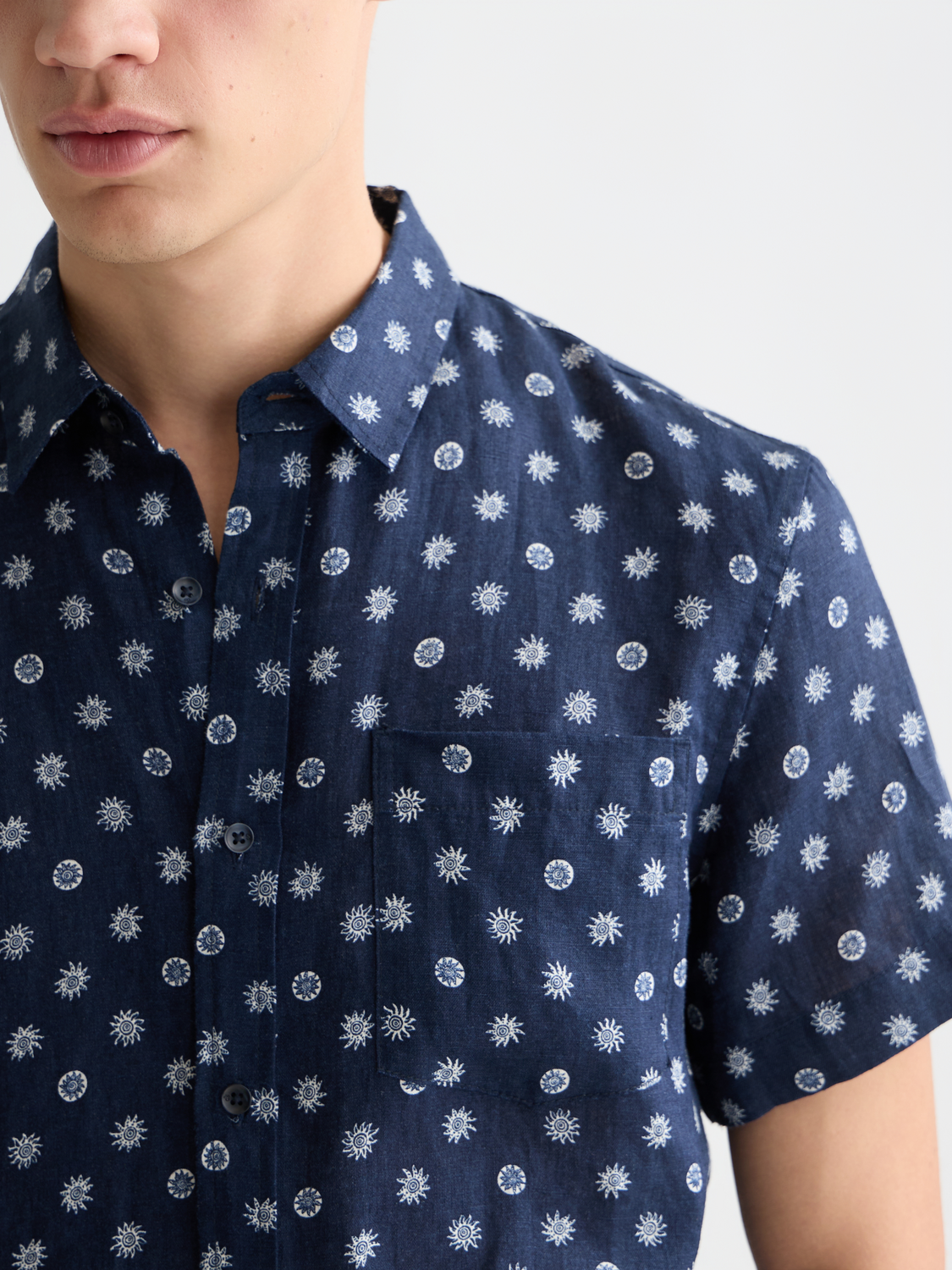 Printed short-sleeved linen shirt by Scotch & Soda, featuring a stylish design and lightweight fabric perfect for warm weather.