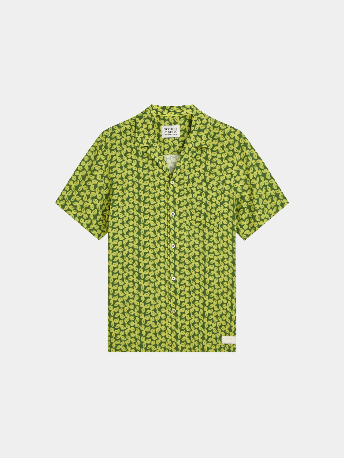 Printed short-sleeved shirt by Scotch & Soda featuring vibrant patterns and a casual fit, displayed on a hanger.