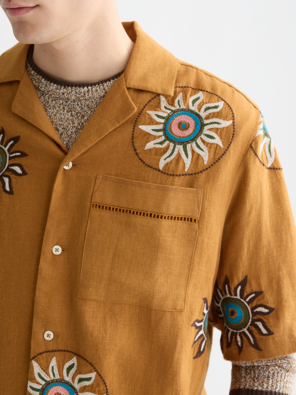 Embroidered linen short-sleeved shirt by Scotch & Soda, featuring intricate embroidery and lightweight, breathable fabric.