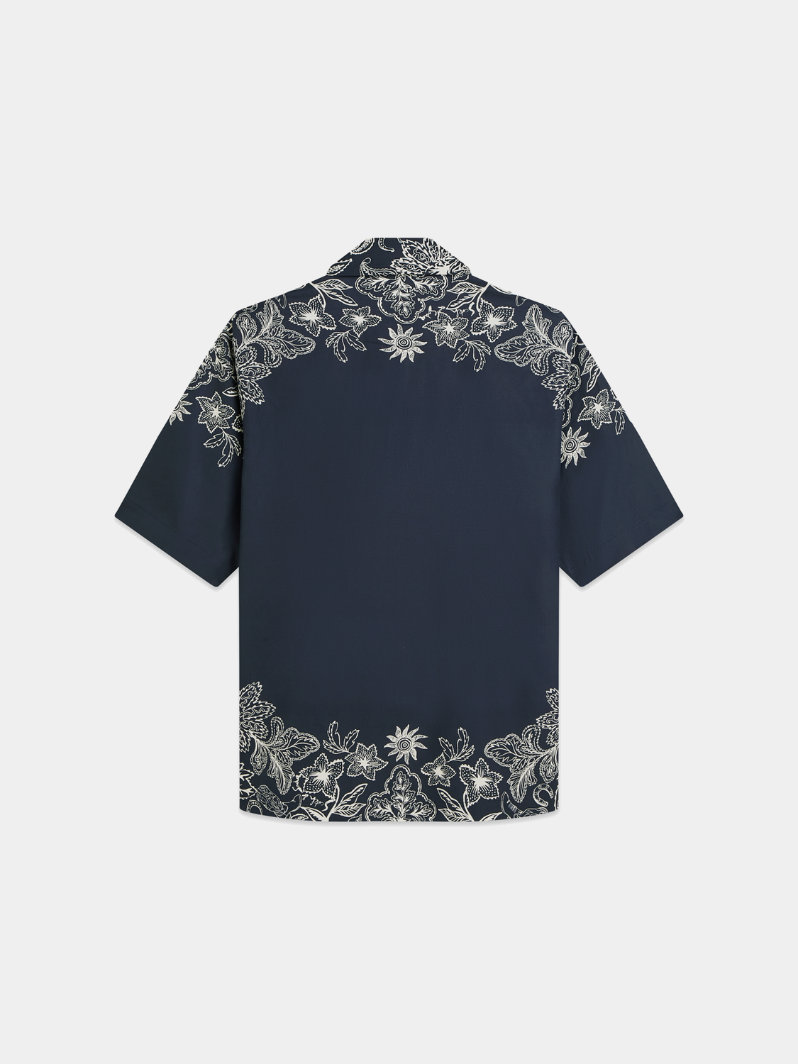 Printed short-sleeved shirt by Scotch & Soda featuring vibrant patterns and casual fit, shown on a mannequin.
