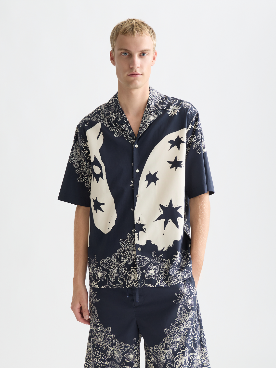 Printed Scotch & Soda short-sleeved shirt with a vibrant pattern, featuring a classic collar and button front.