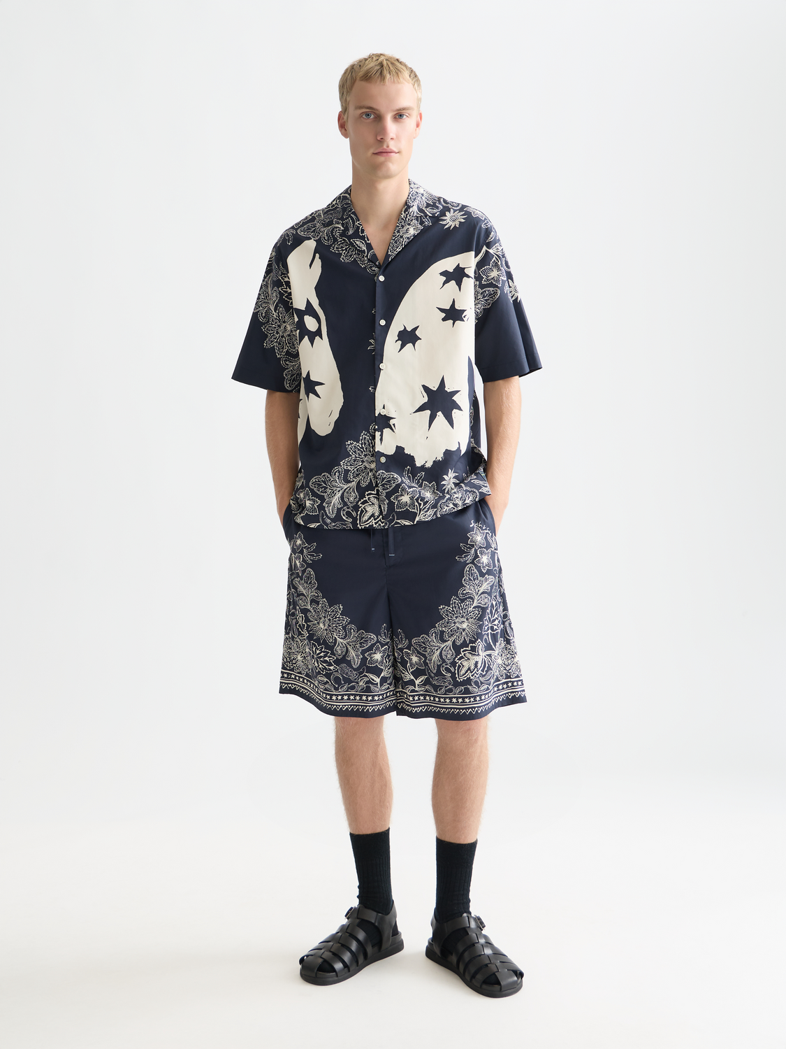 Printed short-sleeved shirt by Scotch & Soda, featuring a stylish design and classic fit, displayed on a hanger.