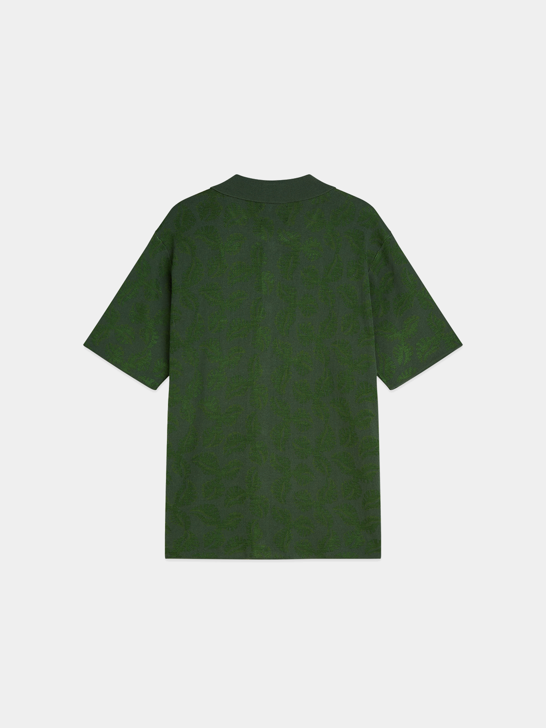 Knitted jacquard short-sleeved shirt by Scotch & Soda, showcasing detailed knitwear pattern in dark color.