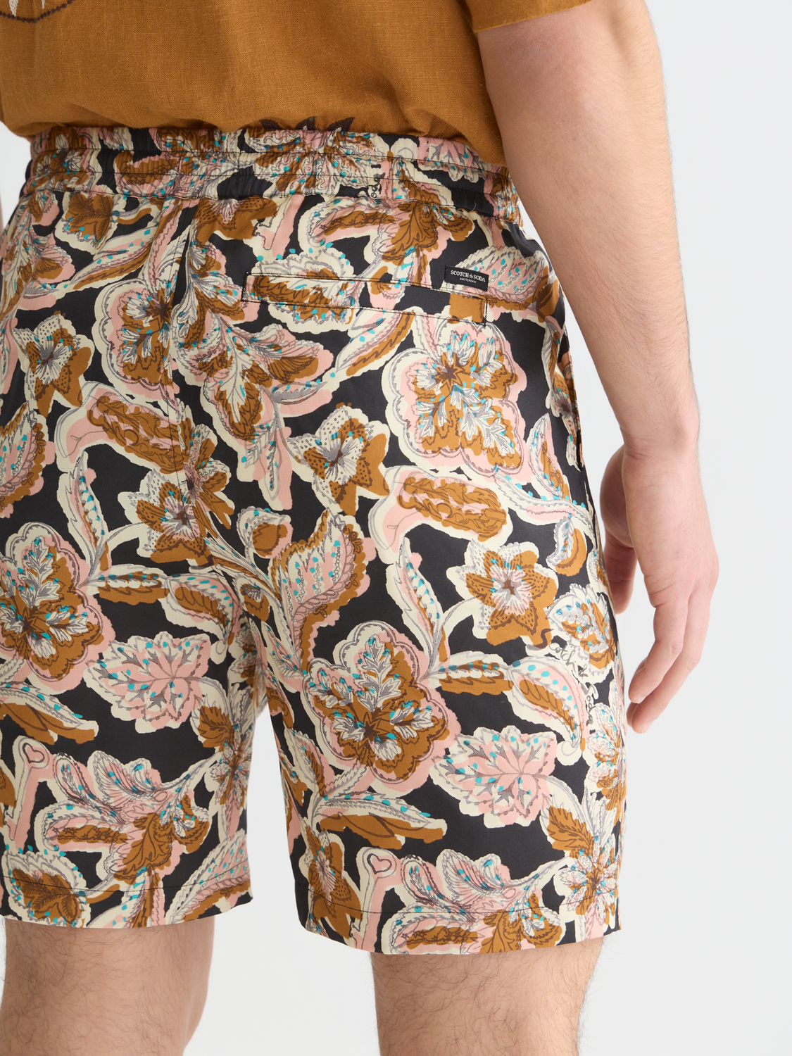 SCOTCH & SODA Fave printed shorts with vibrant pattern, casual fit, and lightweight fabric, perfect for summer wear.