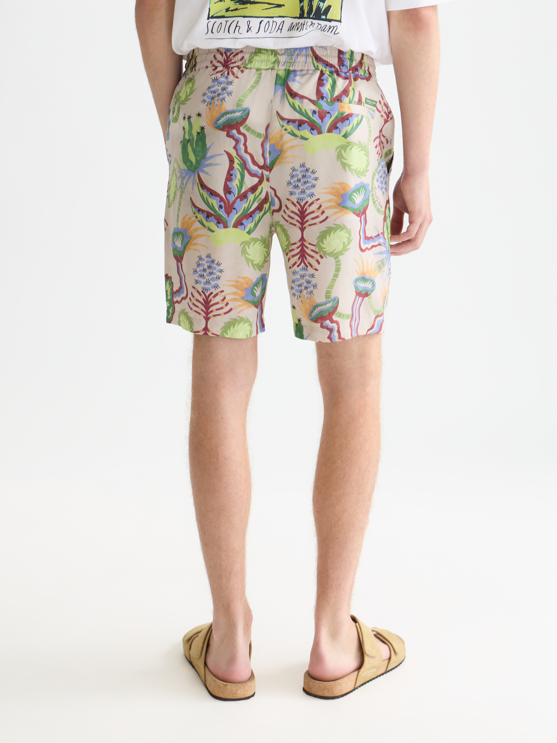 SCOTCH & SODA printed shorts with vibrant design, featuring a relaxed fit and colorful pattern, suitable for casual summer wear.