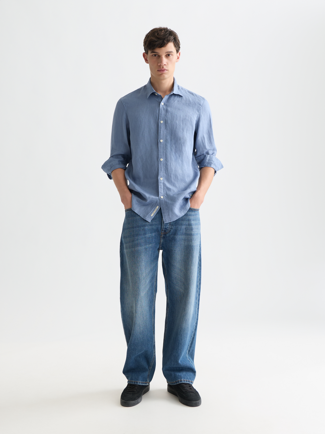 Light beige Scotch & Soda long-sleeve linen shirt with a classic collar and button front, displayed on a neutral background.