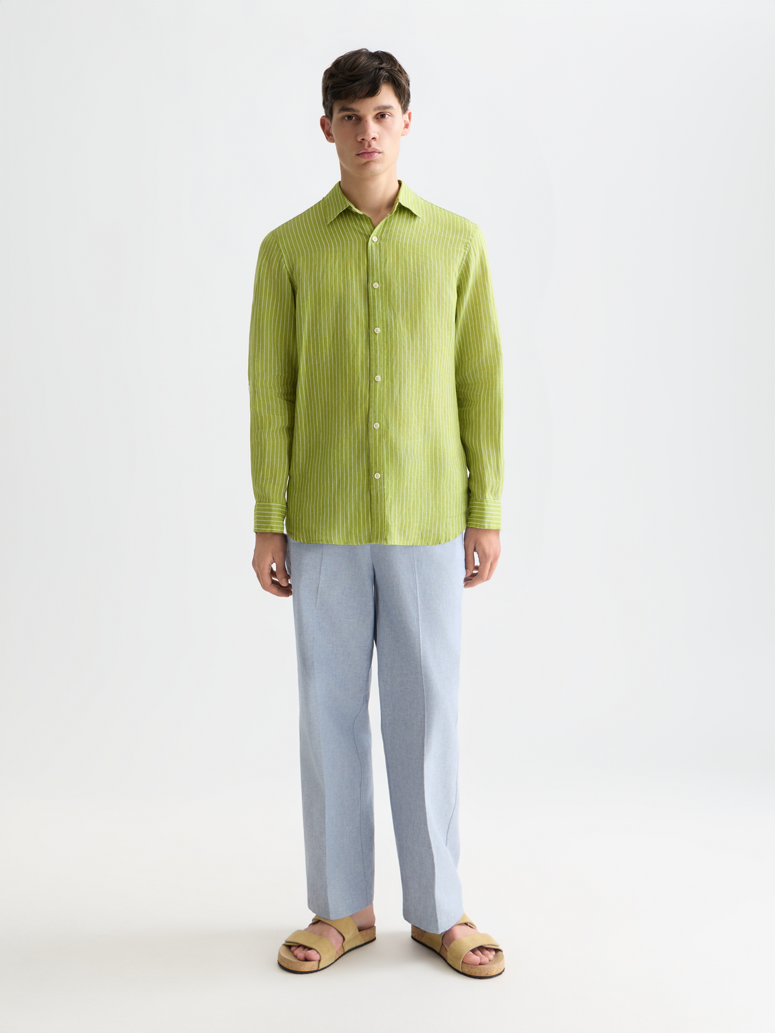 Long-sleeve striped linen shirt by Scotch & Soda, featuring a casual fit and classic pattern, ideal for warm weather wear.