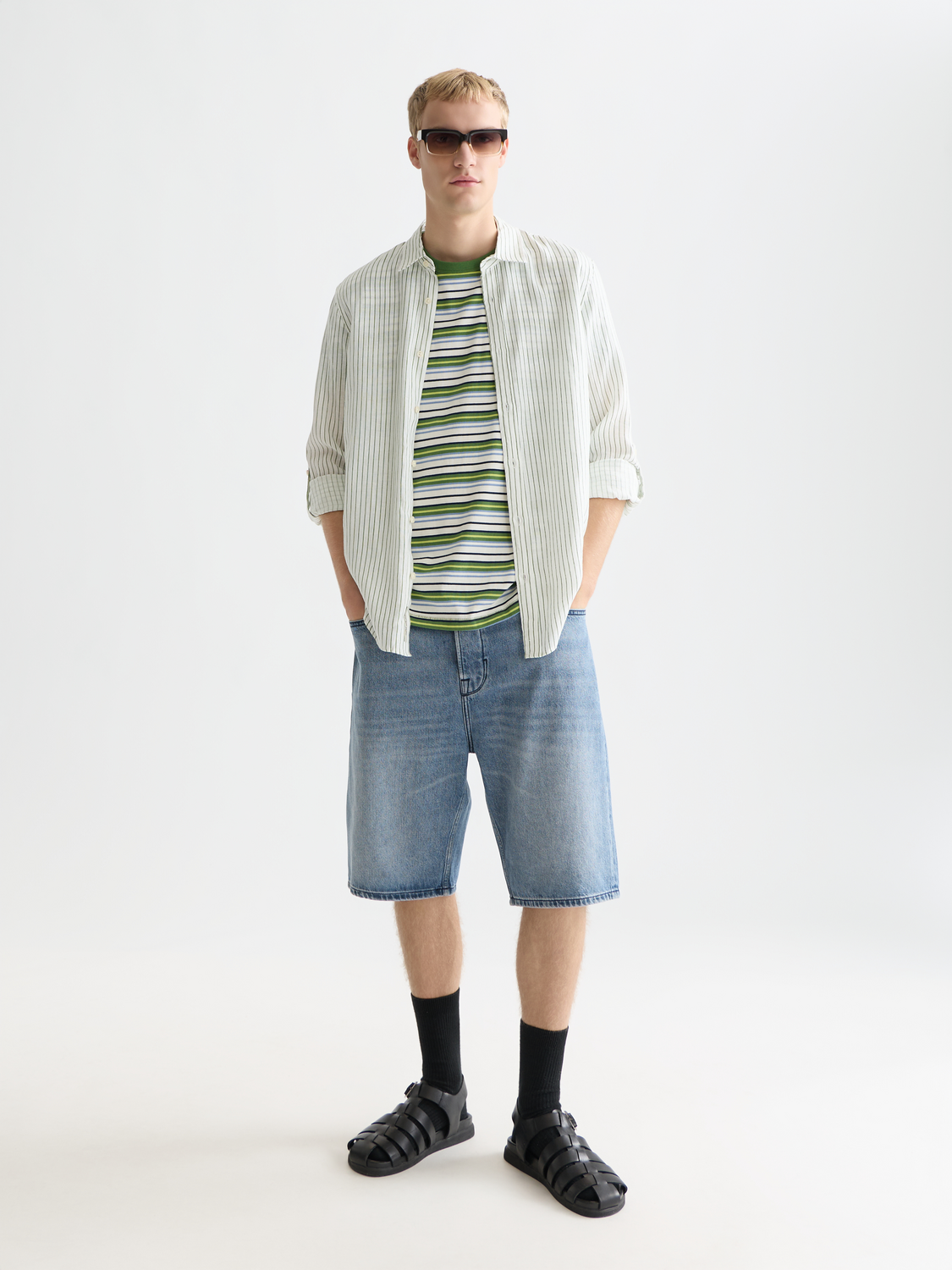 Long-sleeve striped linen shirt by Scotch & Soda, featuring a casual fit and classic pattern, shown on a model.