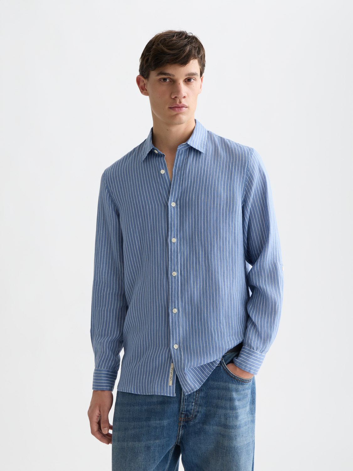 Long-sleeve striped linen shirt by Scotch & Soda, featuring a relaxed fit and classic pattern, shown front view.