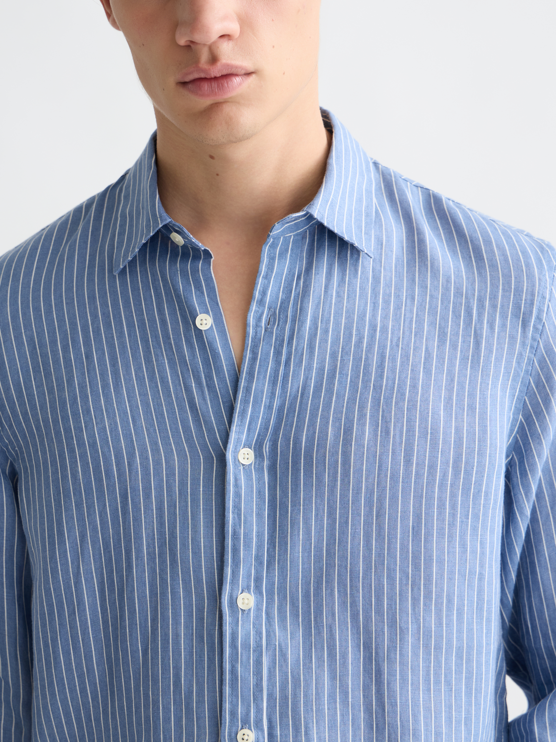 Long-sleeve striped linen shirt by Scotch & Soda, featuring a classic design and lightweight fabric.