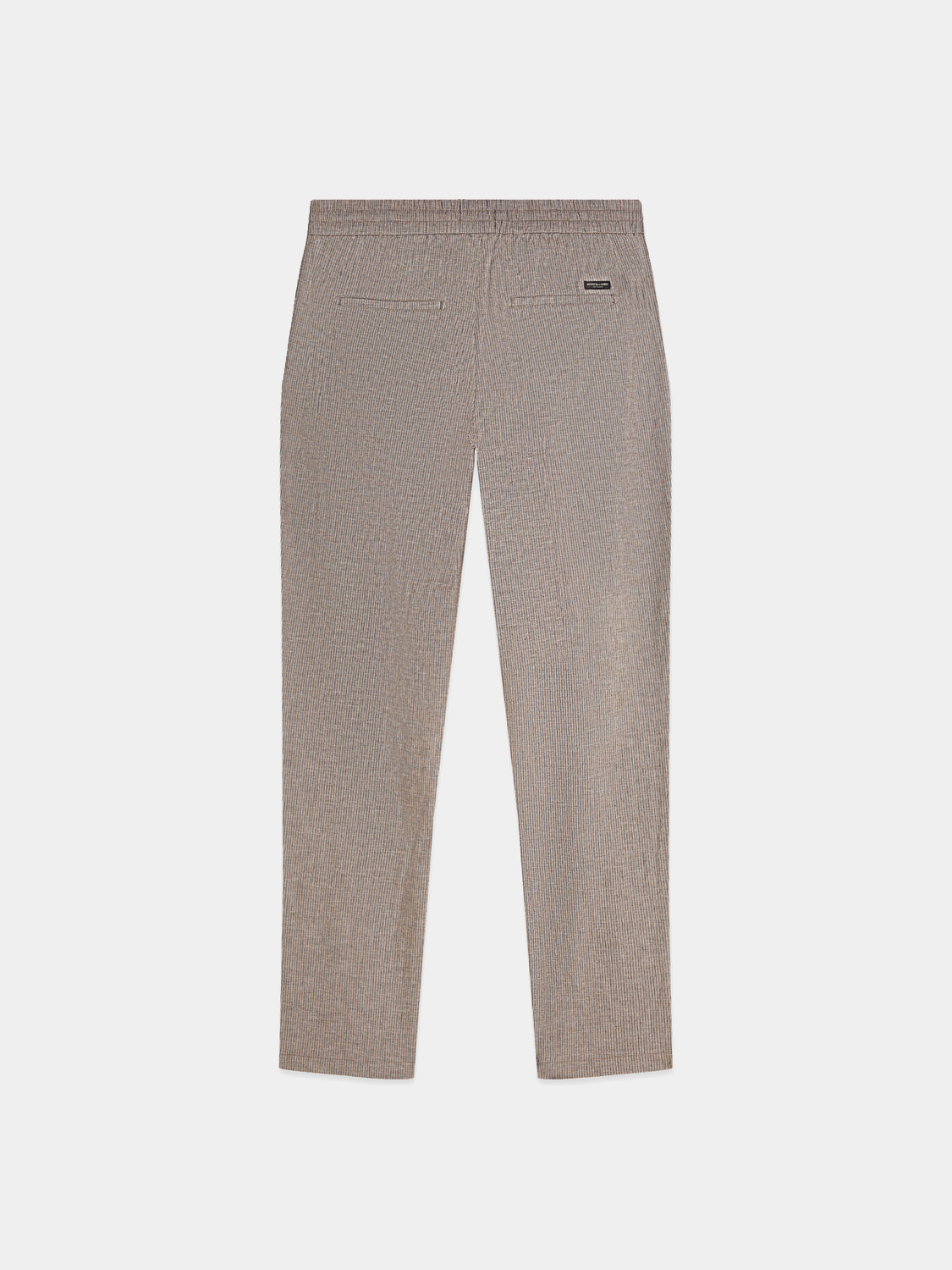 Black Warren joggers by Scotch & Soda, casual pants with a relaxed fit and elastic waistband, shown from the back view.