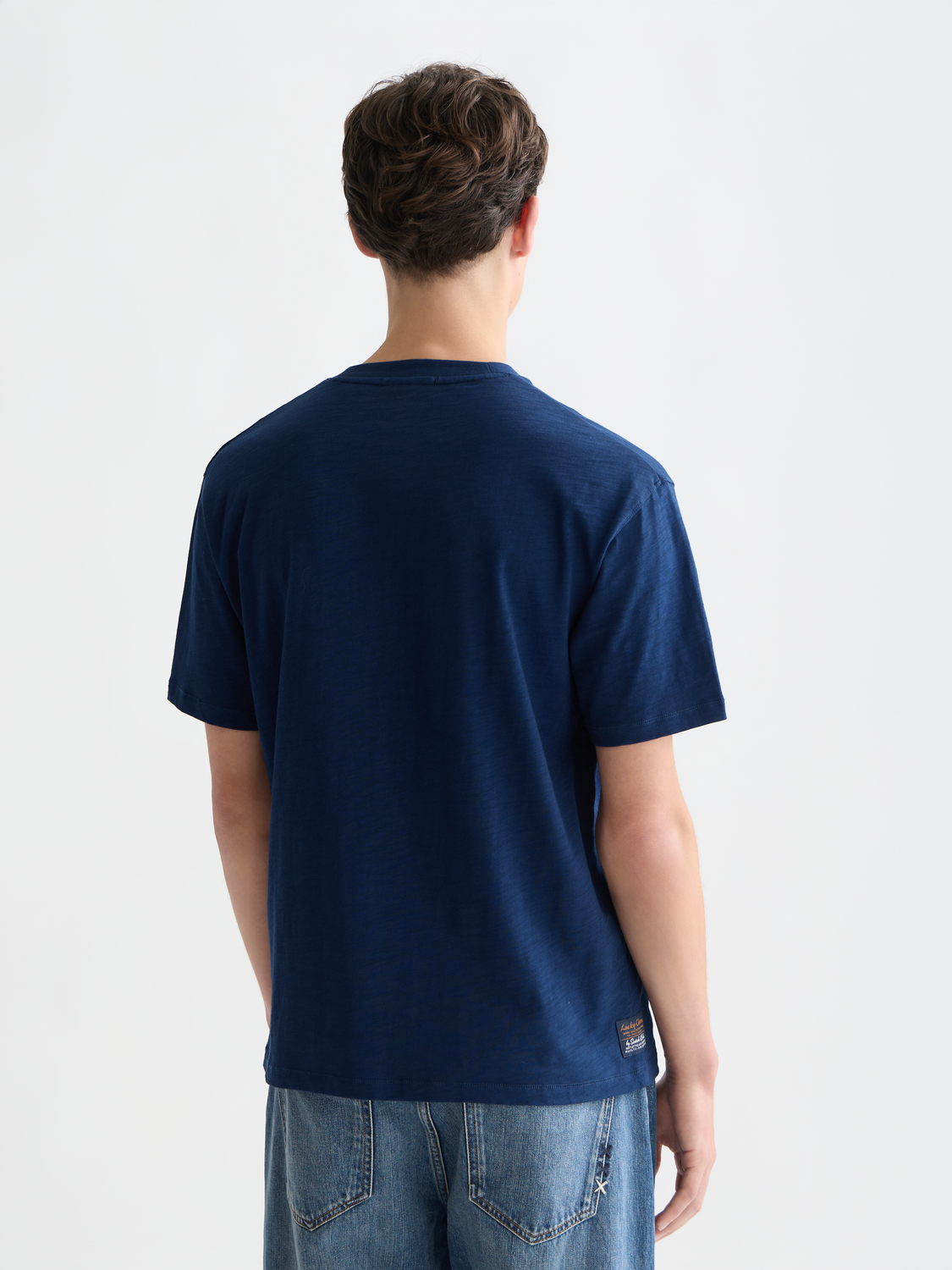 Scotch & Soda short sleeve artwork t-shirt featuring a colorful graphic design on the front.