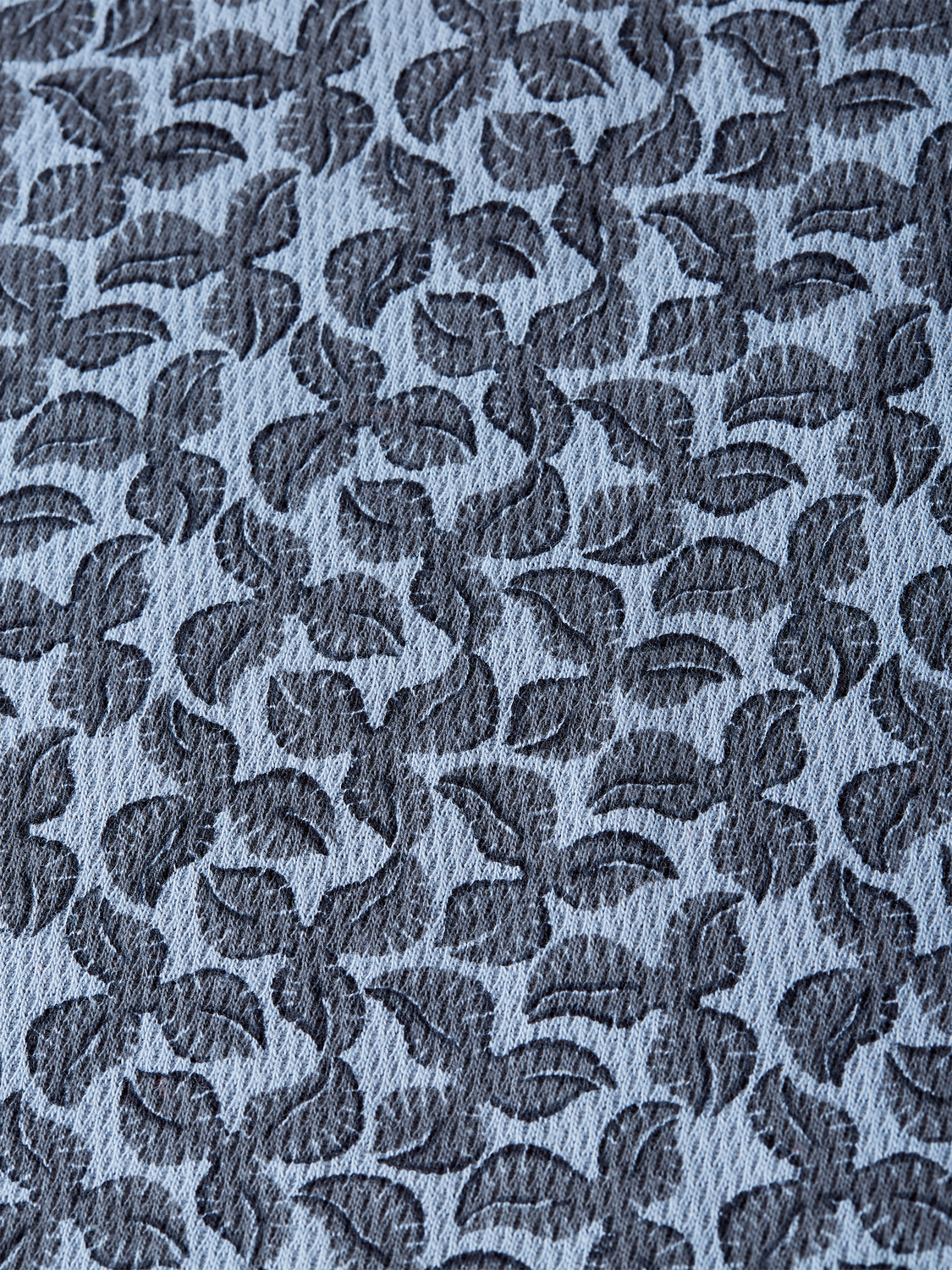 Printed Scotch & Soda polo shirt with a colorful design, short sleeves, and classic collar, perfect for casual wear.