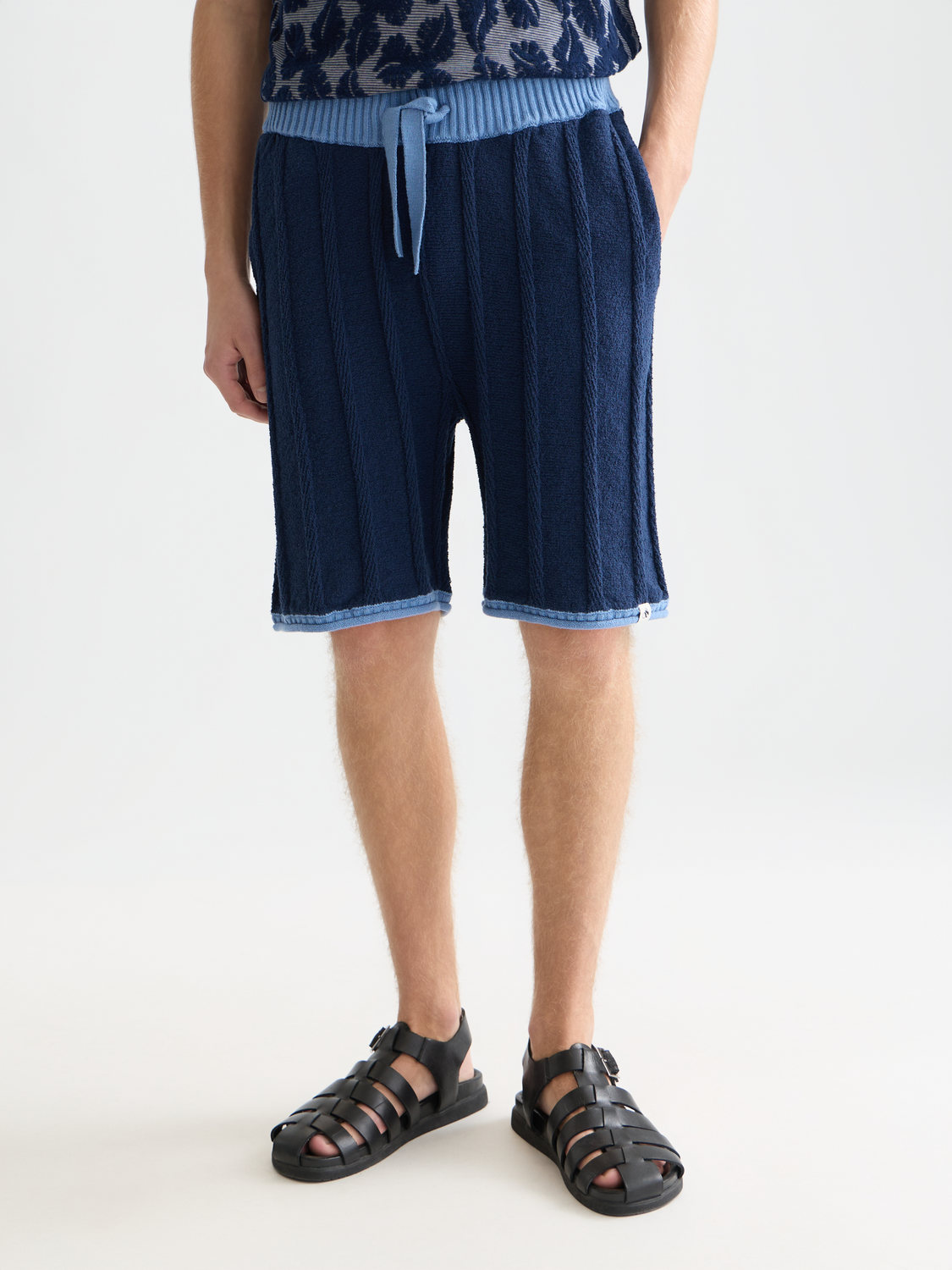 Knitted shorts by Scotch & Soda featuring a textured fabric, front view with a relaxed fit and stylish design.