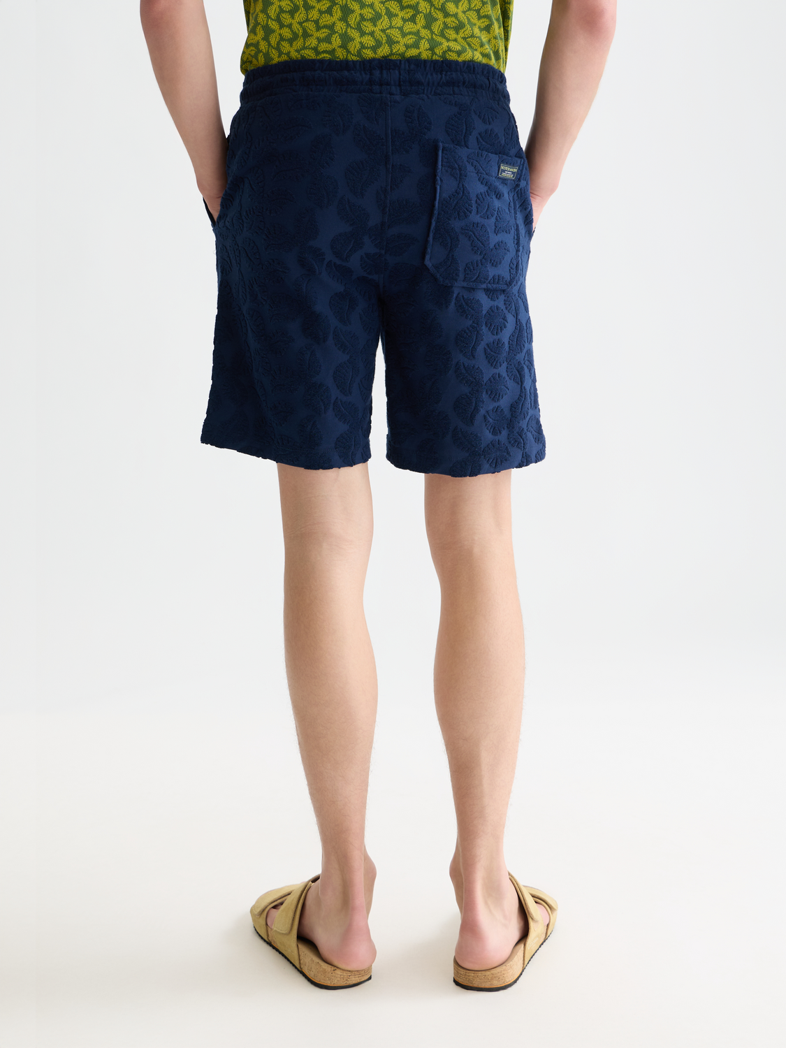 SCOTCH & SODA Fave terry shorts in soft fabric, featuring a relaxed fit and casual design, shown from the back.