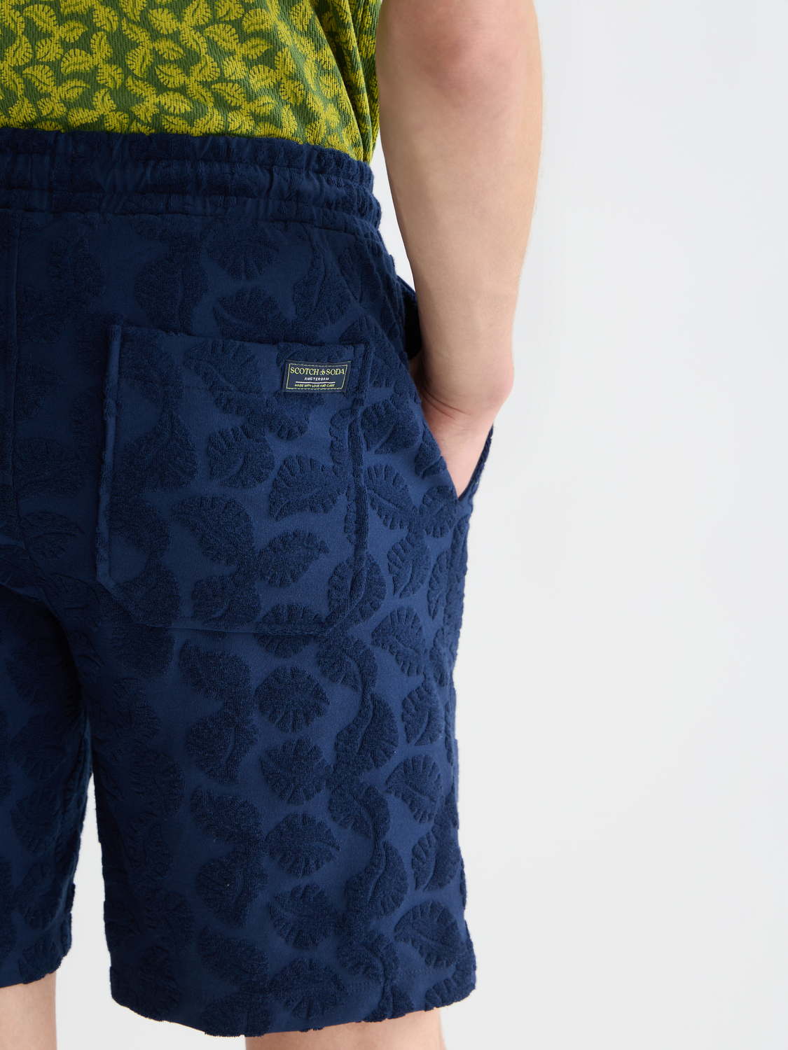 Light blue Scotch & Soda Fave terry shorts with a relaxed fit and elastic waistband, displayed on a neutral background.