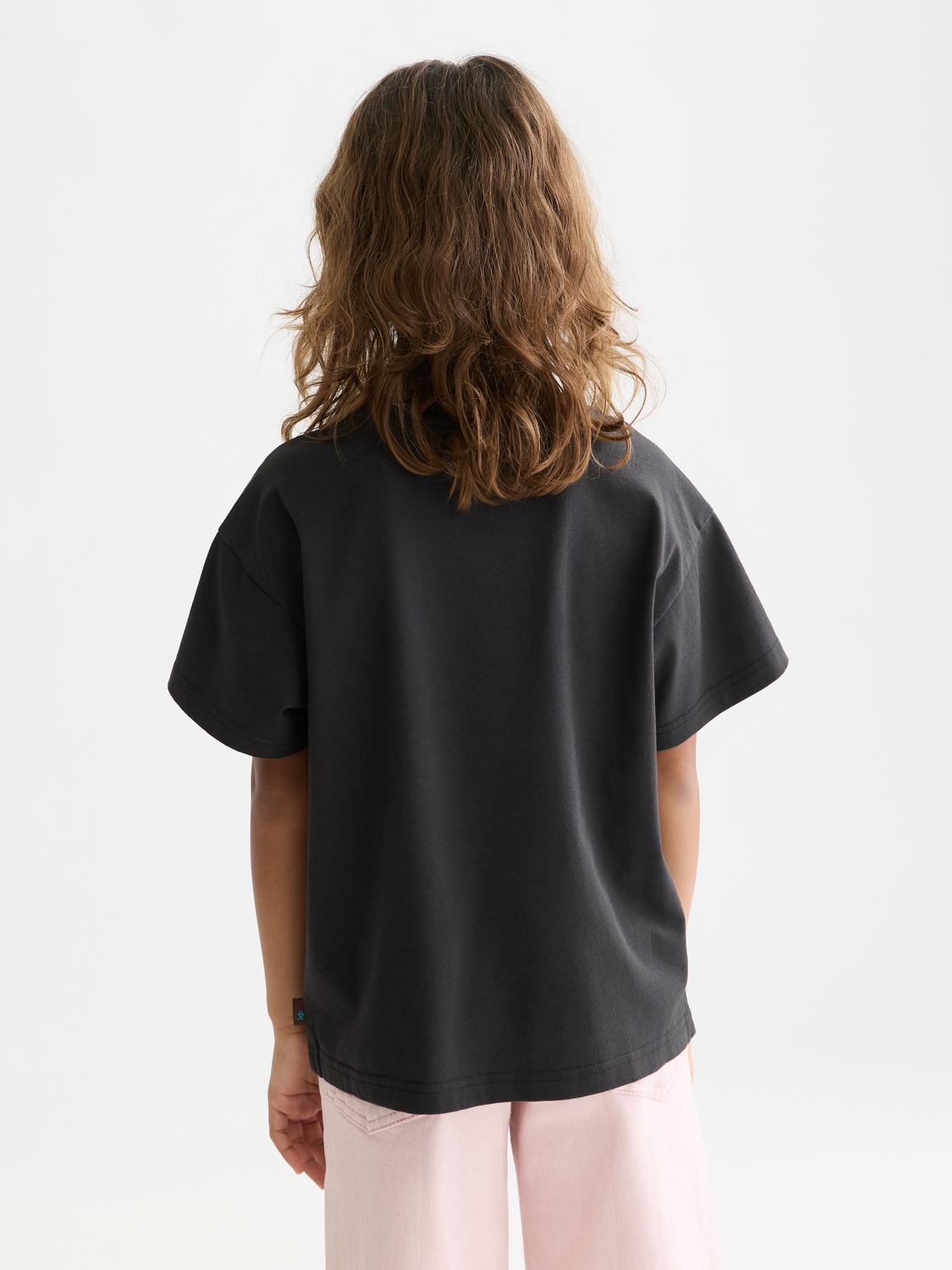Kids' washed artwork T-shirt by Scotch & Soda, short sleeve design with colorful printed graphic on back.