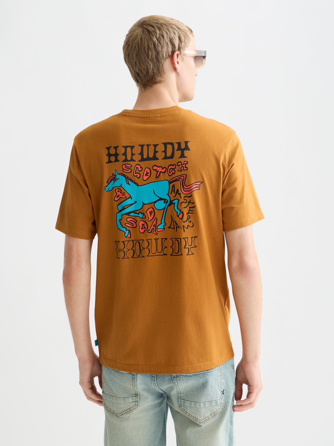Scotch & Soda short sleeve artwork t-shirt with colorful graphic print on front, casual design for men or women.